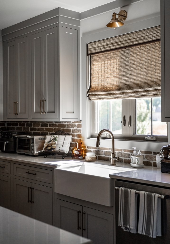 504 McCulley Road Cookeville, TN 38506 - Photo 51 of 70 a kitchen with granite countertop a sink stainless steel appliances and cabinets