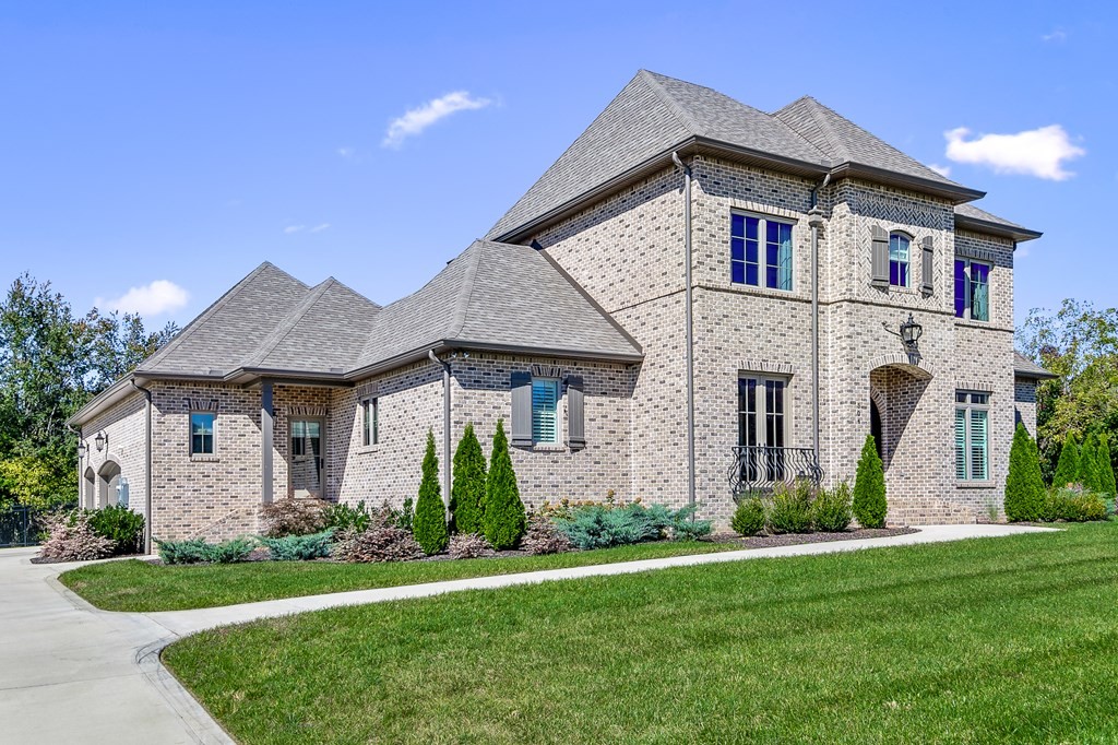 504 McCulley Road Cookeville, TN 38506 - Photo 7 of 70 a front view of a house with a garden and plants