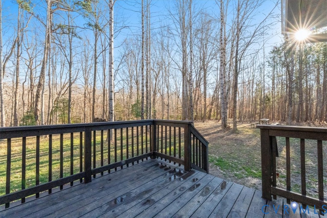11655 Chatham Road Prince George, VA 23875 - Photo 12 of 48 a view of wooden balcony with wooden floor and fence