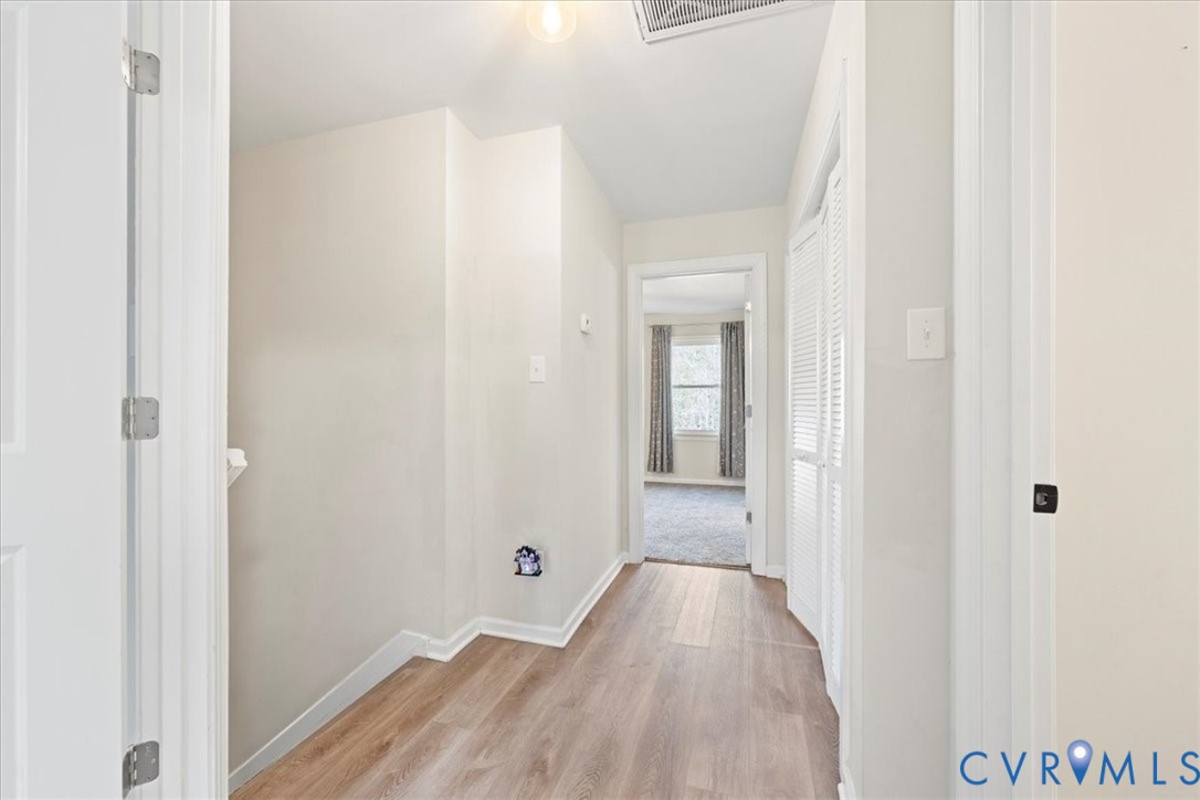 11655 Chatham Road Prince George, VA 23875 - Photo 44 of 48 a view of a hallway with wooden floor