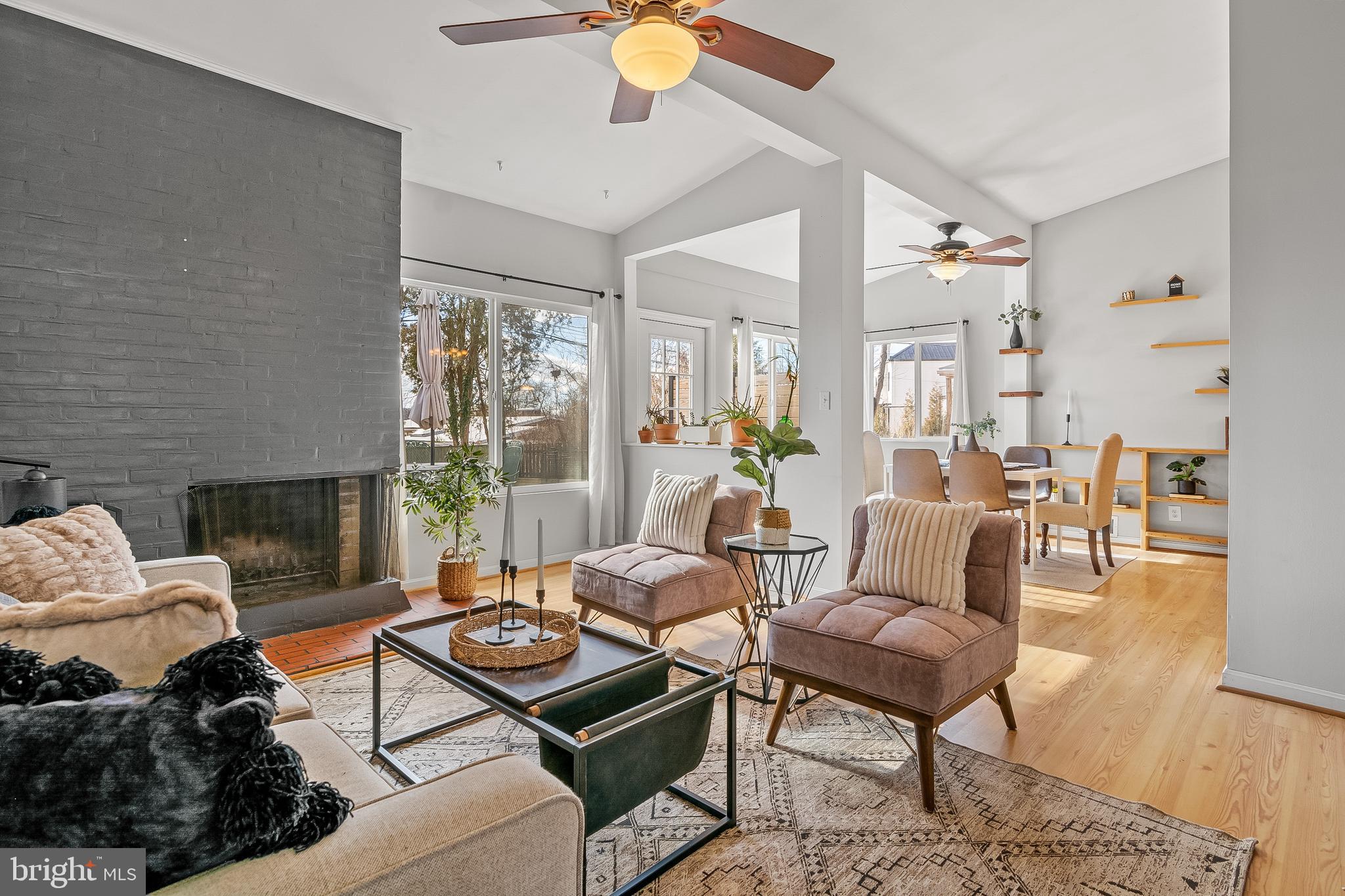 2419 Sylvale Road Baltimore, MD 21209 - Photo 7 of 29 a living room with furniture and a fireplace