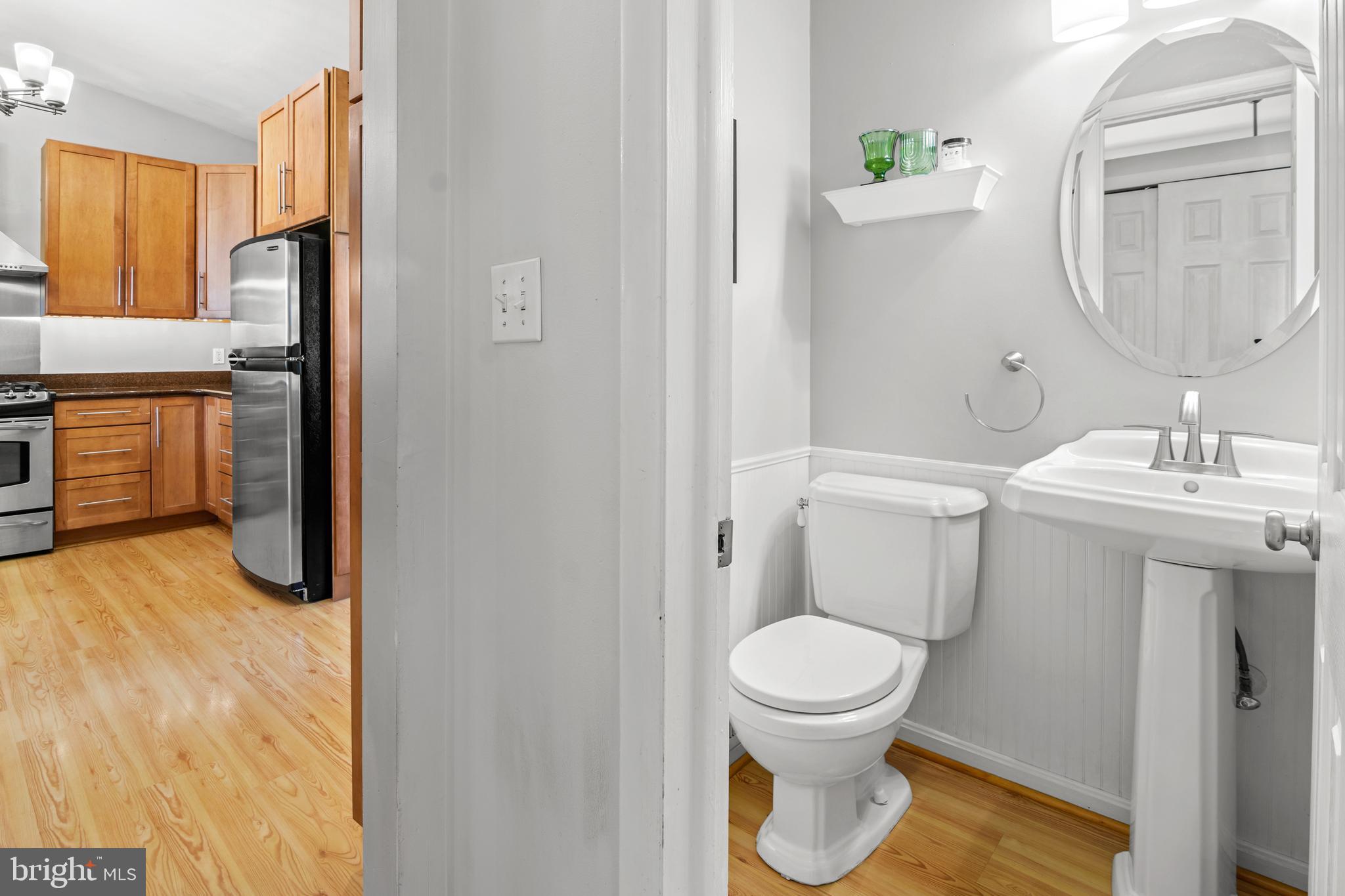 2419 Sylvale Road Baltimore, MD 21209 - Photo 9 of 29 a bathroom with a toilet and a sink