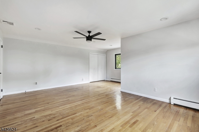 136 Carlough Road Upper Saddle River, NJ 07458 - Photo 17 of 32 wooden floor in an empty room