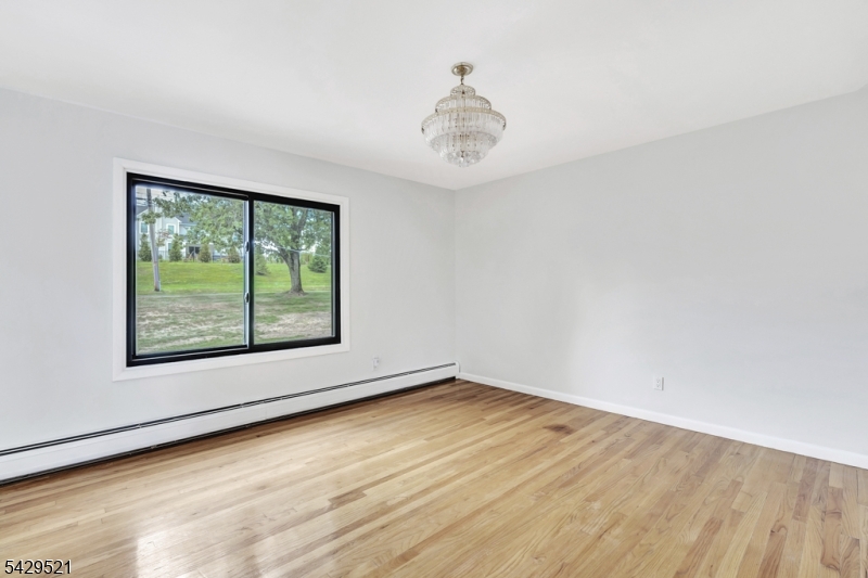 136 Carlough Road Upper Saddle River, NJ 07458 - Photo 20 of 32 an empty room with a window