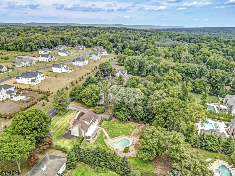 136 Carlough Road Upper Saddle River, NJ 07458 - Photo 29 of 32 a view of a lake with a yard