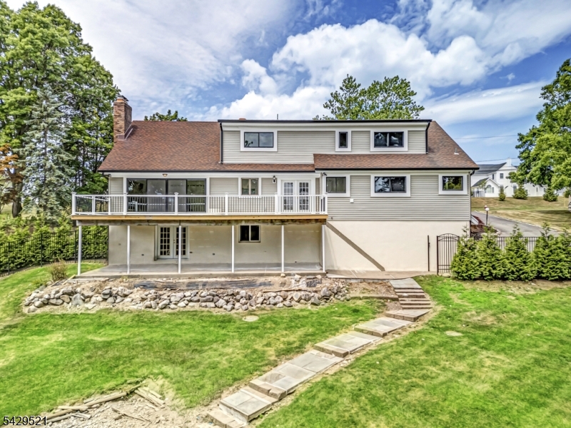 136 Carlough Road Upper Saddle River, NJ 07458 - Photo 32 of 32 front view of a house with a yard