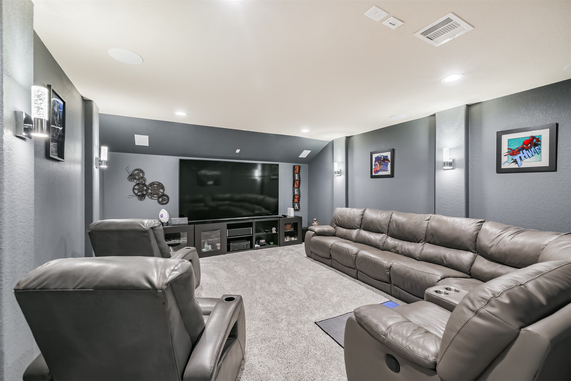 24047 Schults Meadow Lane Spring, TX 77389 - Photo 33 of 47 a living room with furniture and a flat screen tv
