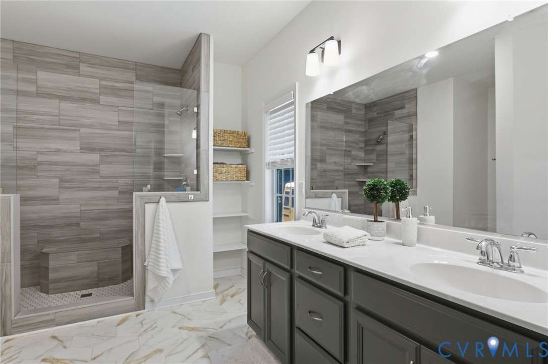 1495 Dominion Springs Road Powhatan, VA 23139 - Photo 25 of 49 Primary bathroom with double vanity and large walk