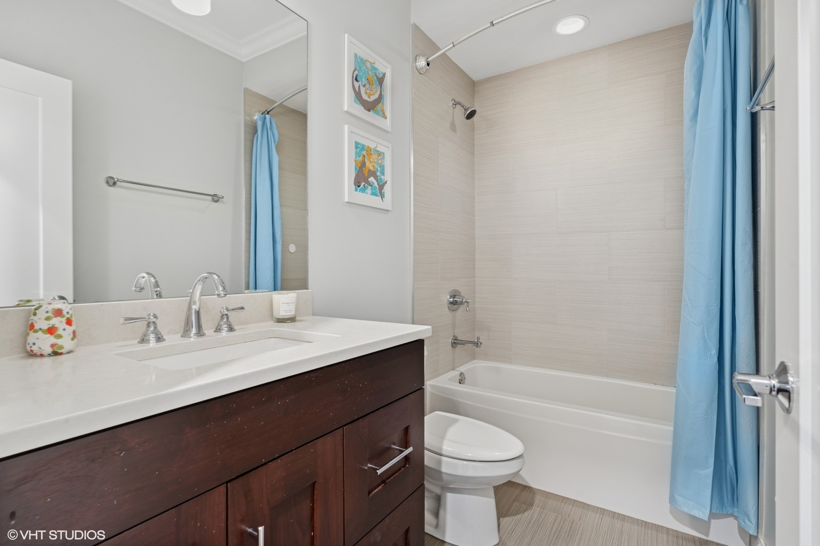 886 West Lill Avenue, Unit 1 Chicago, IL 60614 - Photo 18 of 22 a bathroom with a sink a toilet and shower