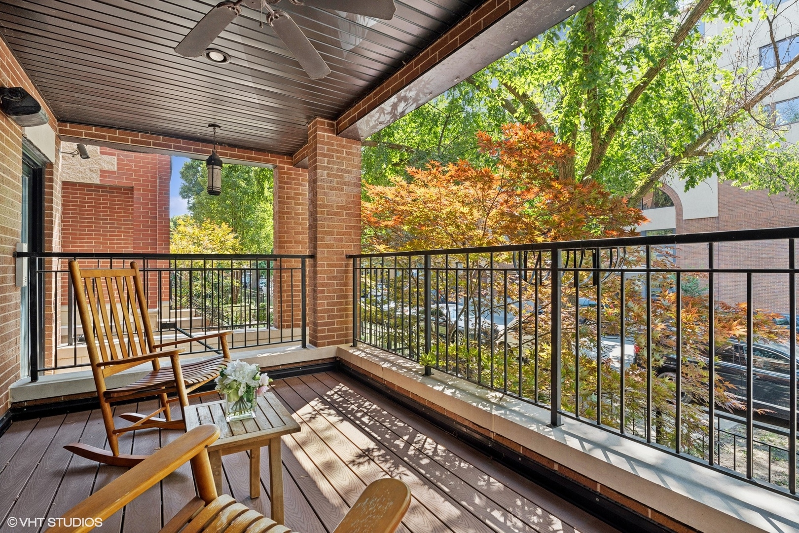 886 West Lill Avenue, Unit 1 Chicago, IL 60614 - Photo 20 of 22 a view of a balcony with wooden floor