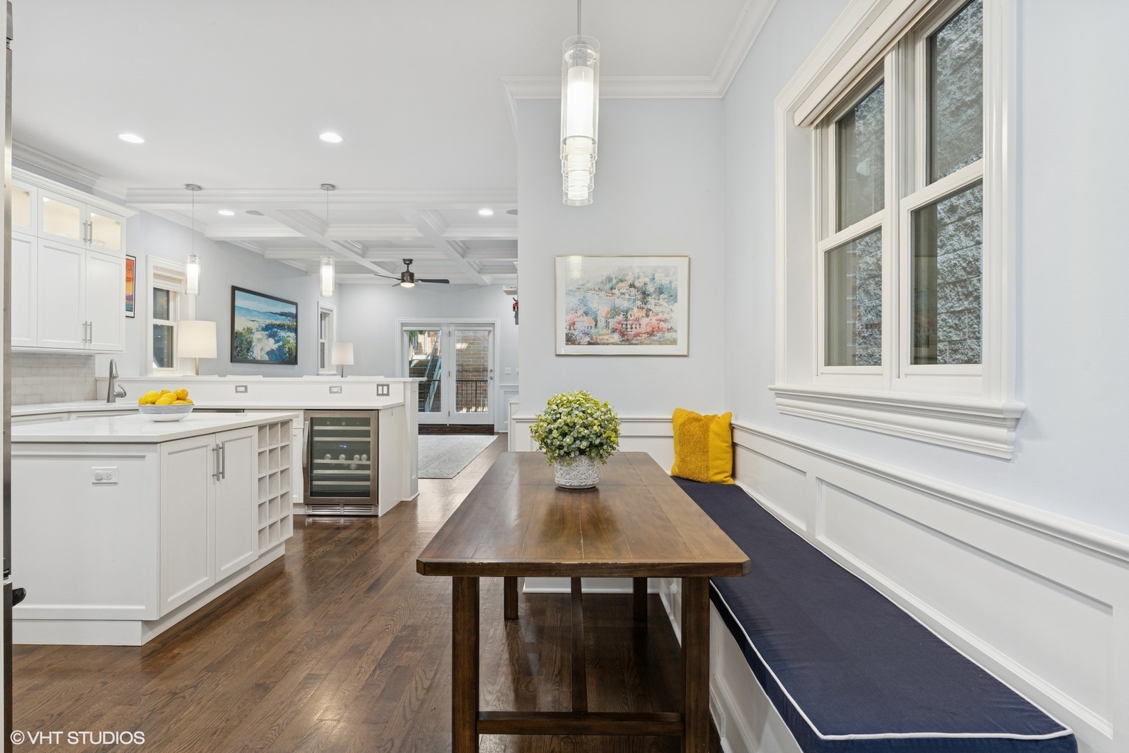 886 West Lill Avenue, Unit 1 Chicago, IL 60614 - Photo 9 of 22 a kitchen with a table chairs sink and cabinets
