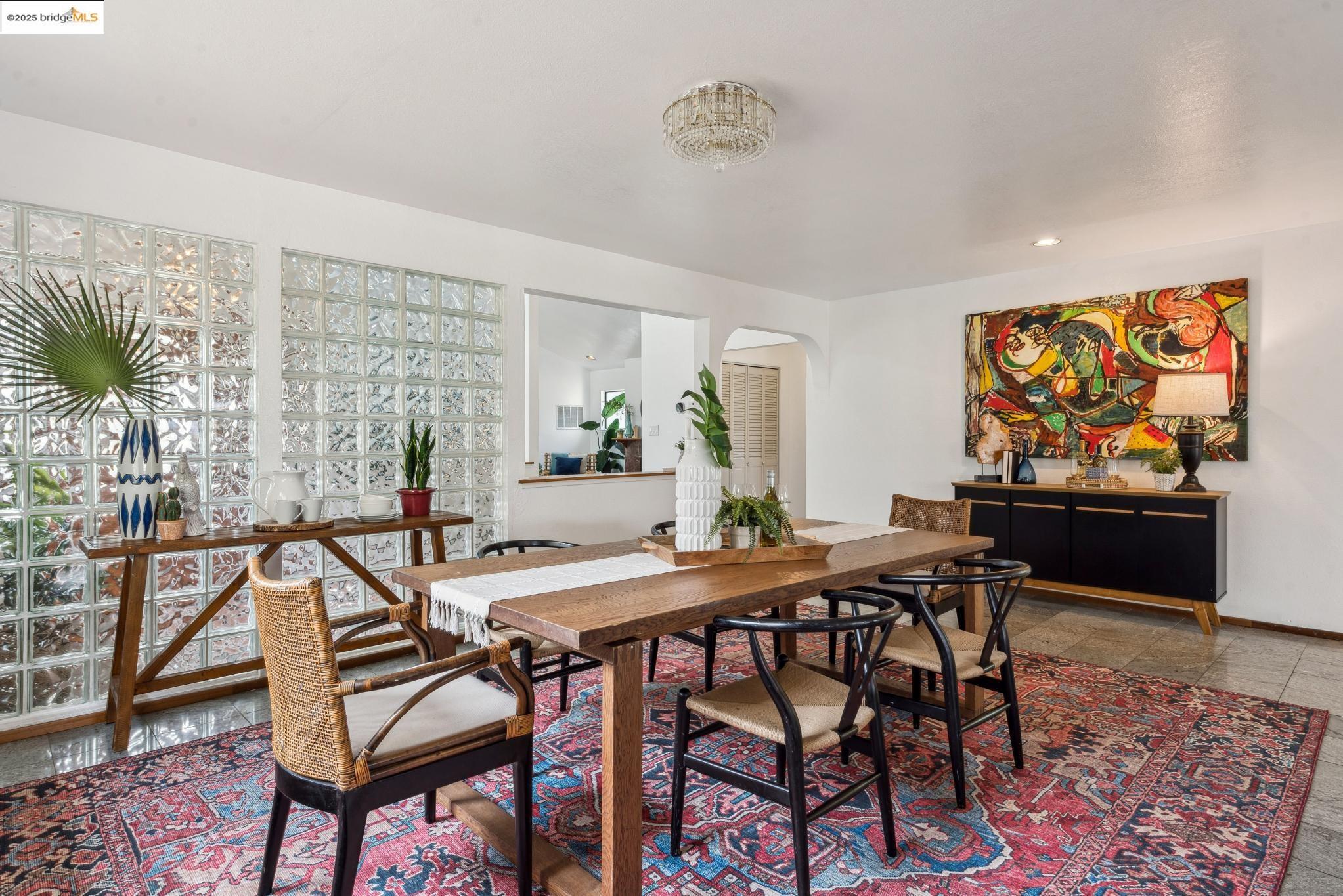Undisclosed Address San Leandro, CA 94577 - Photo 11 of 50 a view of a dining room with furniture and wooden floor