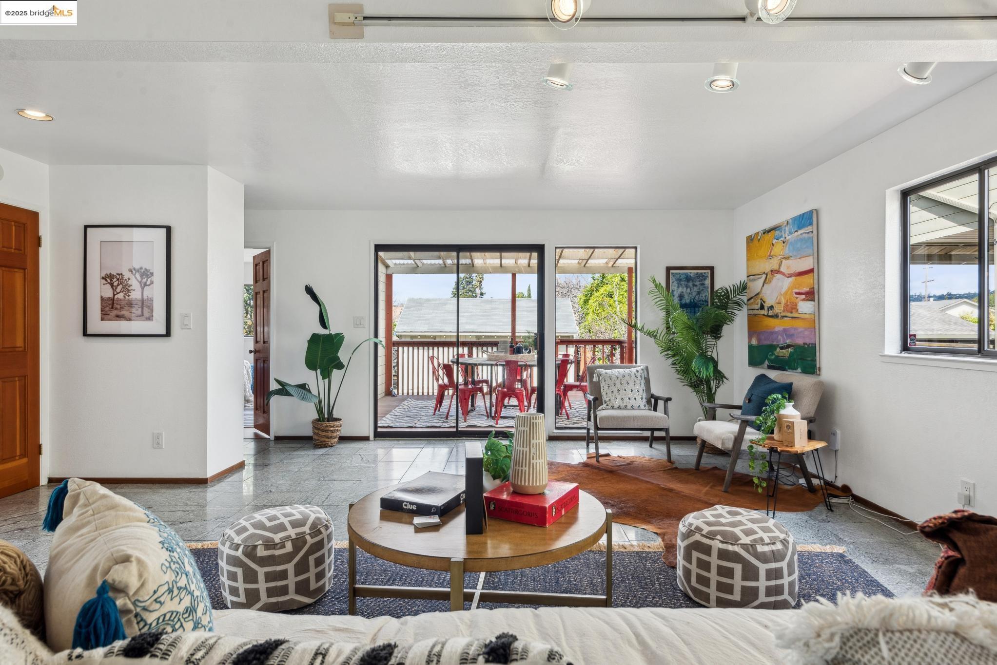 Undisclosed Address San Leandro, CA 94577 - Photo 14 of 50 a living room with furniture and a potted plant