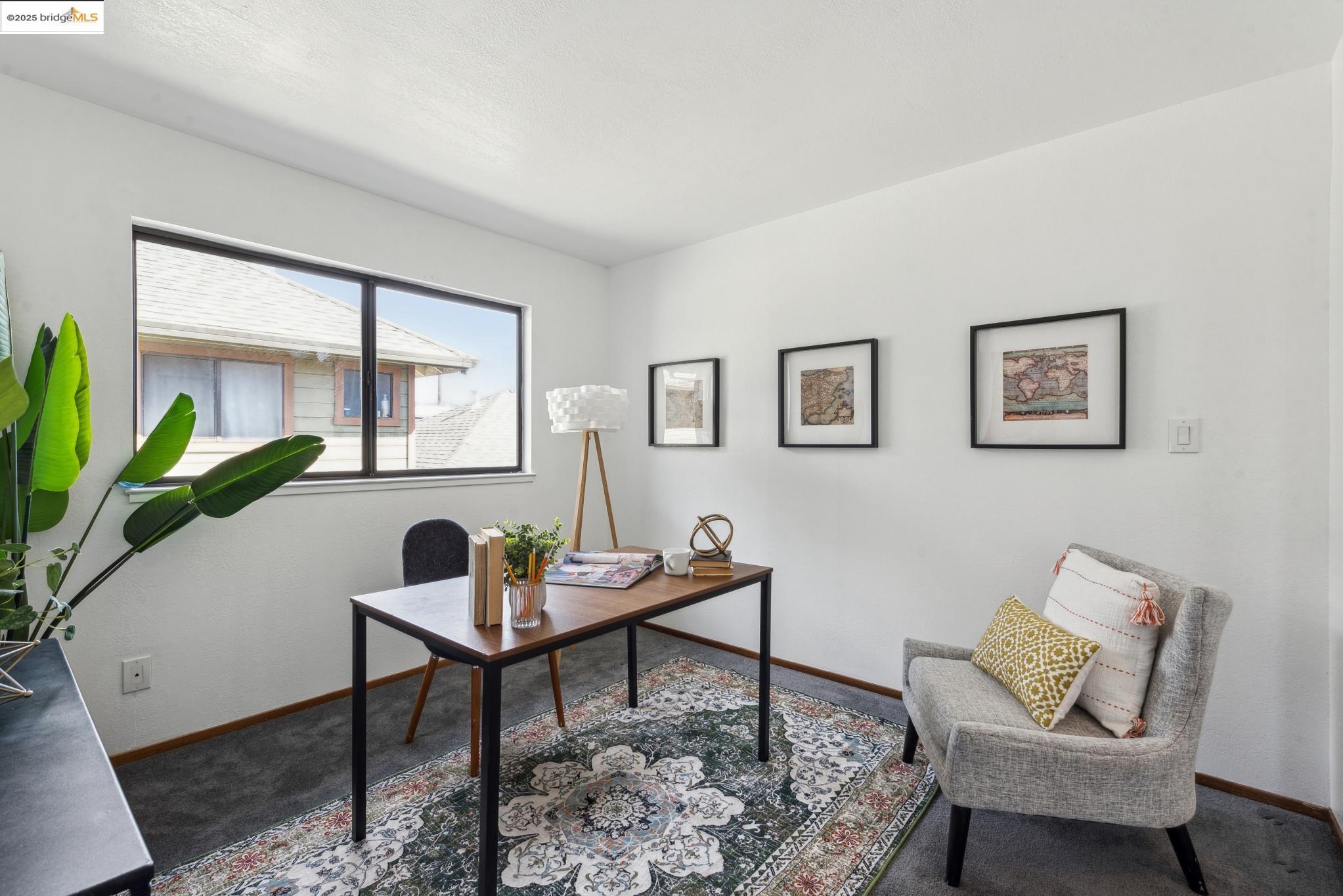 Undisclosed Address San Leandro, CA 94577 - Photo 32 of 50 a living room with furniture and a potted plant