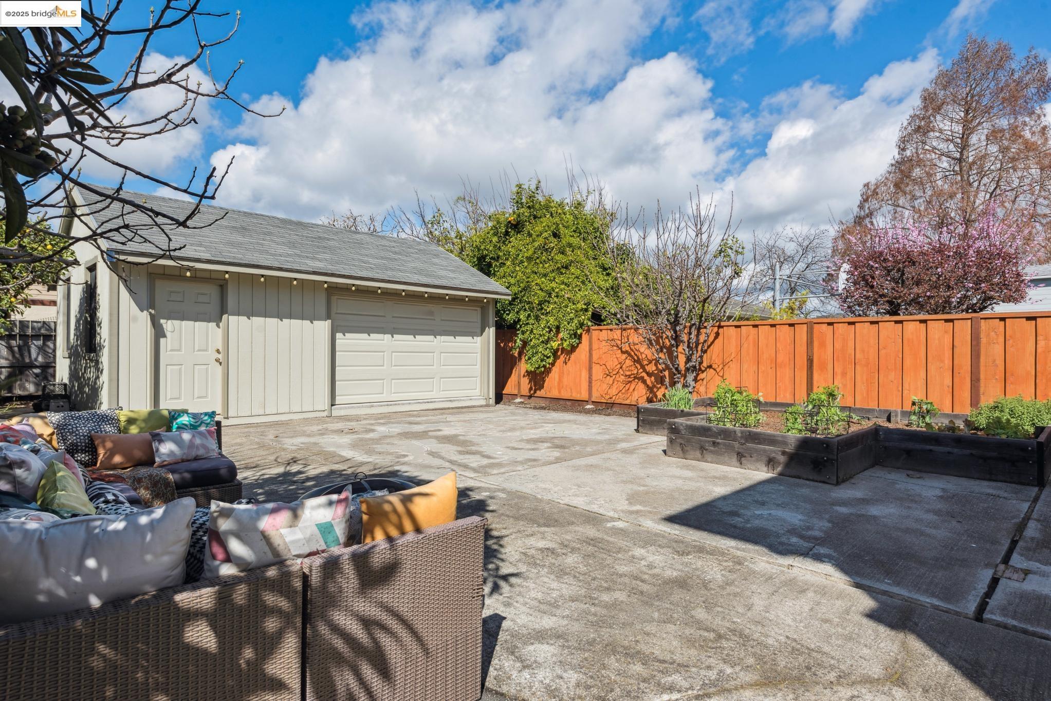 Undisclosed Address San Leandro, CA 94577 - Photo 45 of 50 a backyard of a house with yard and outdoor seating