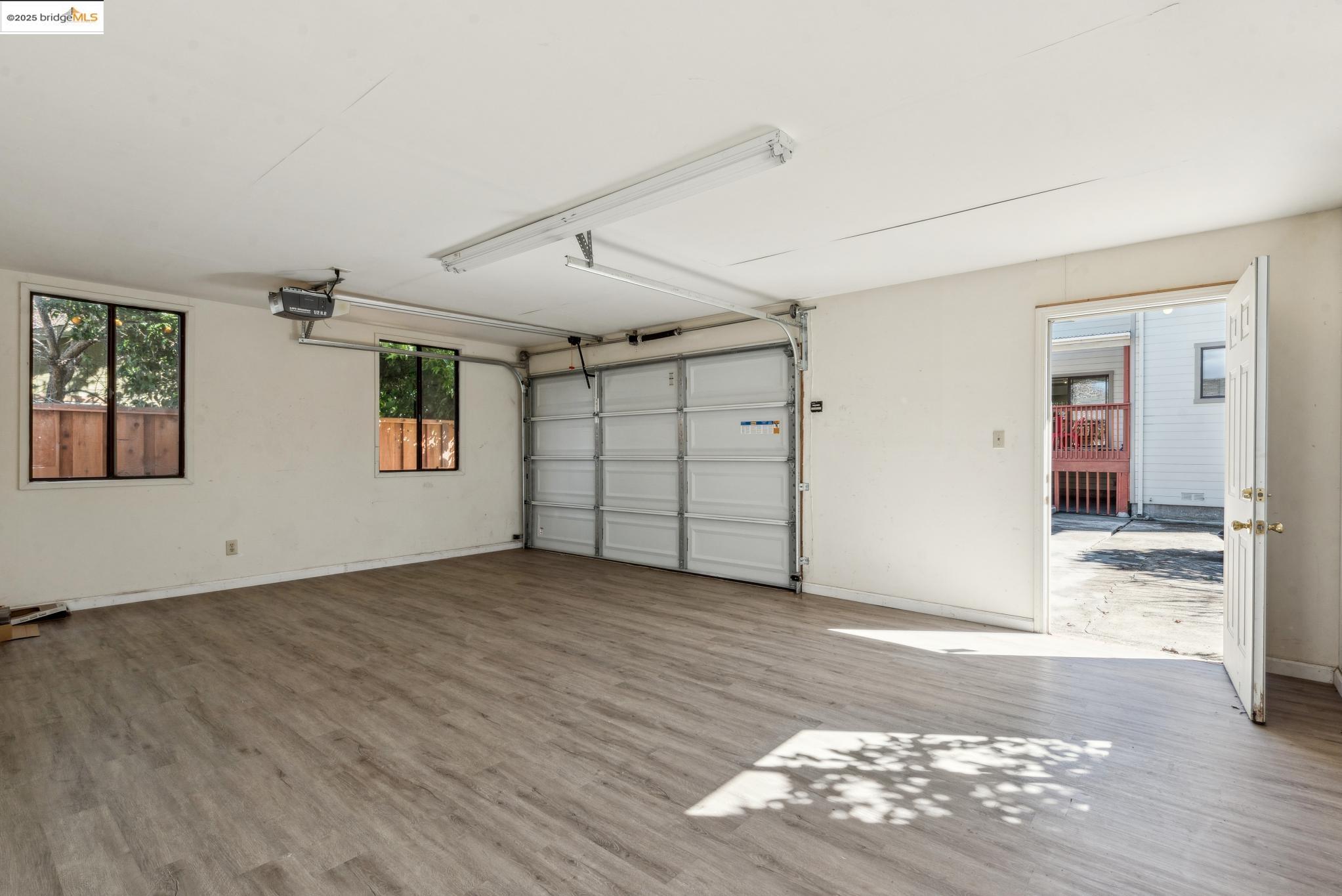 Undisclosed Address San Leandro, CA 94577 - Photo 47 of 50 a view of a livingroom with wooden floor and white walls