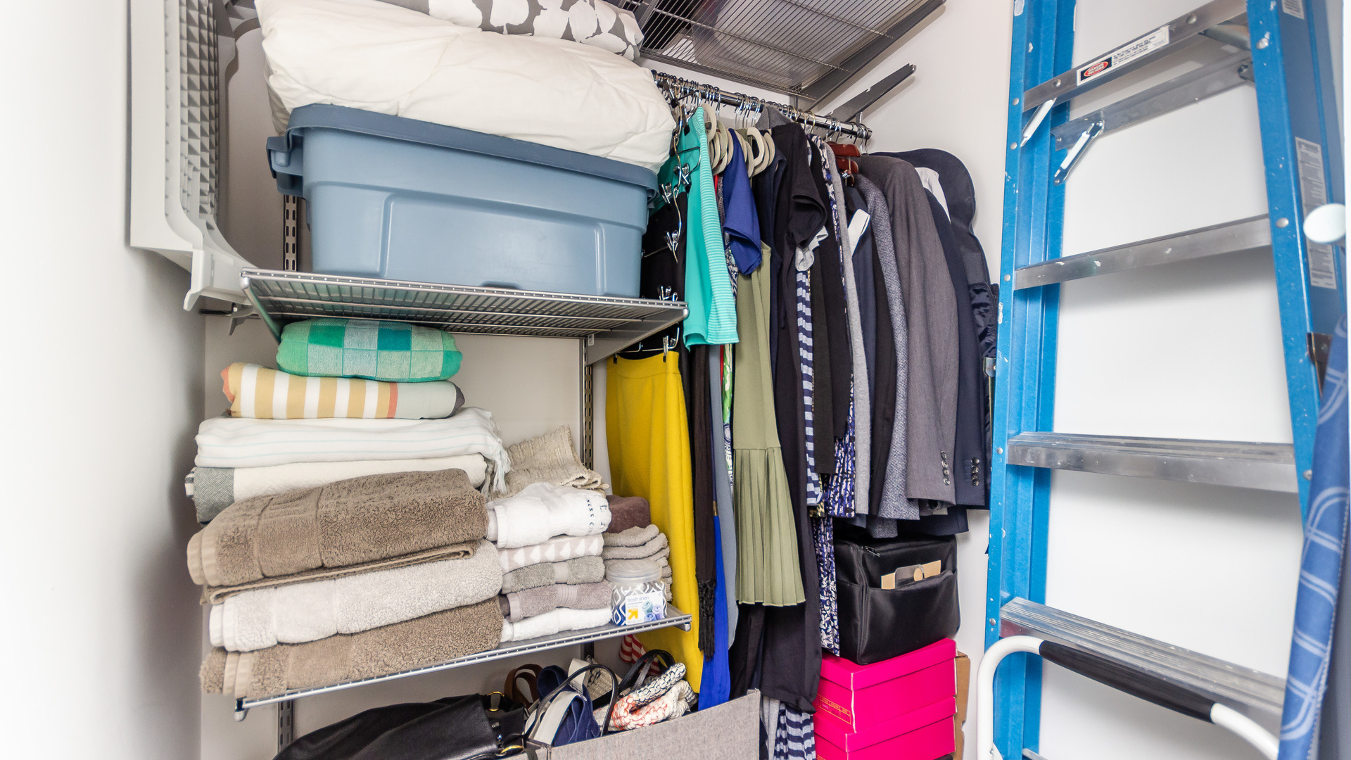 2112 West Rice Street, Unit 1 Chicago, IL 60622 - Photo 13 of 14 a view of walk in closet with clothes and shoes