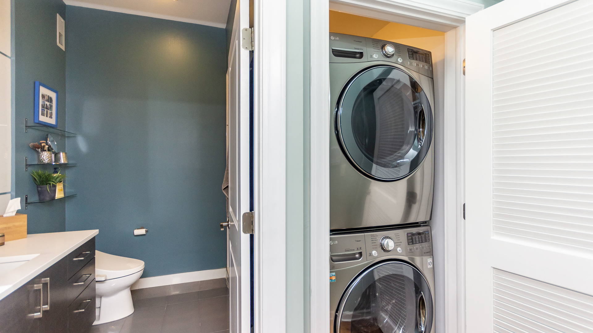 2112 West Rice Street, Unit 1 Chicago, IL 60622 - Photo 10 of 14 a view of a bathroom with washing machine and a sink