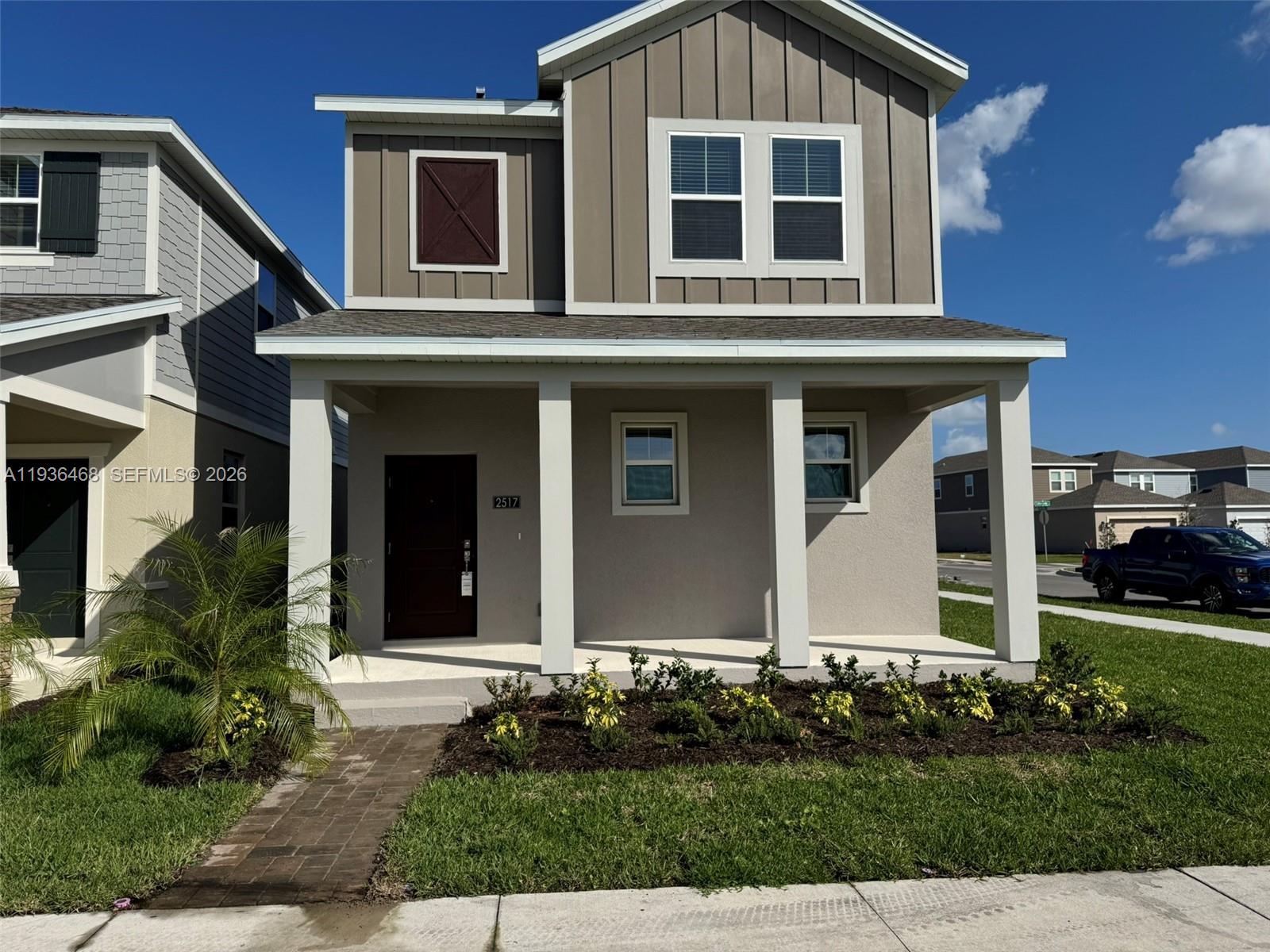 2517 Spring Tune Alley Kissimmee, FL 34744 - Photo 1 of 16 a house view with a garden space