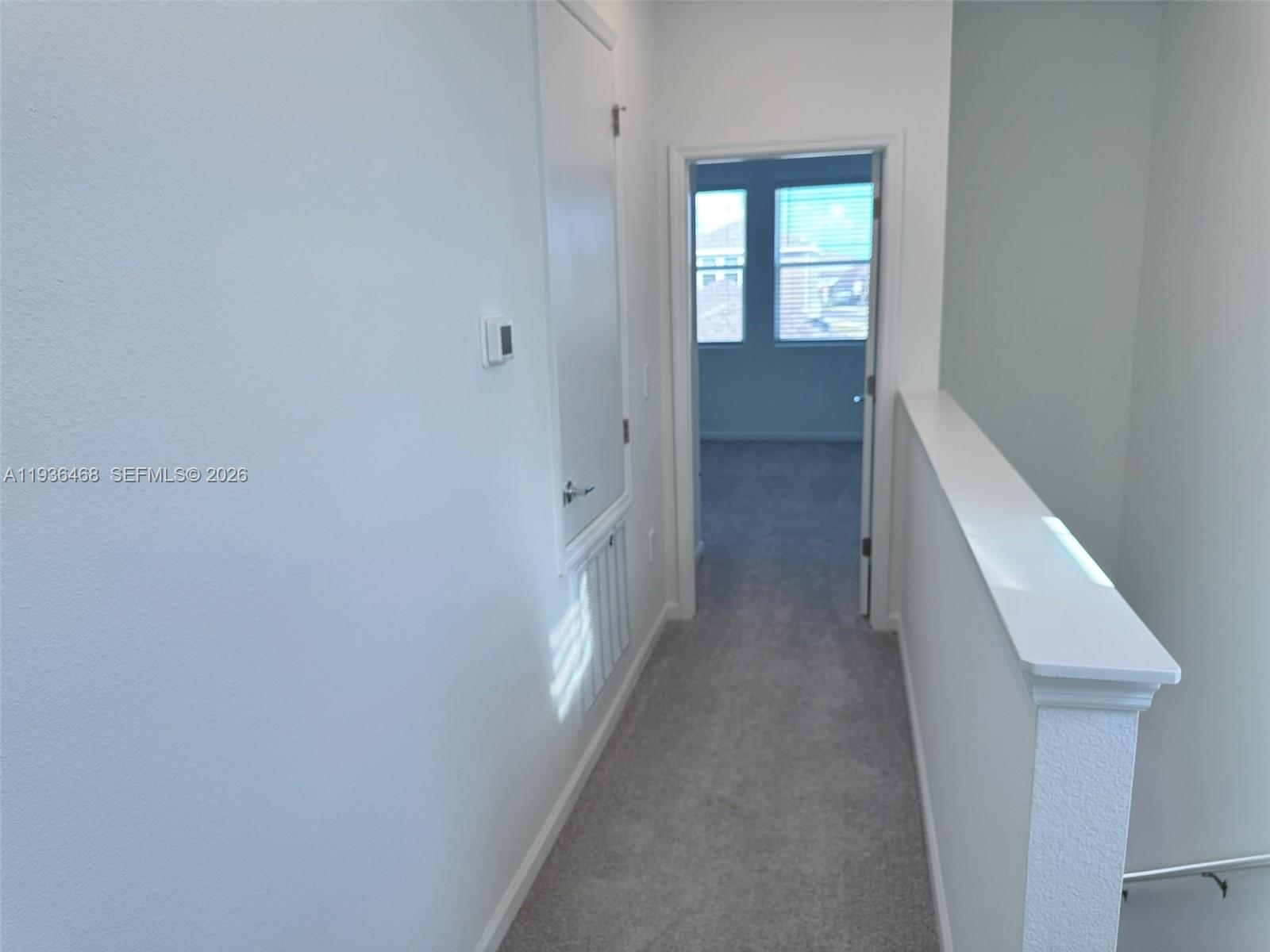 2517 Spring Tune Alley Kissimmee, FL 34744 - Photo 11 of 16 a view of hallway with window