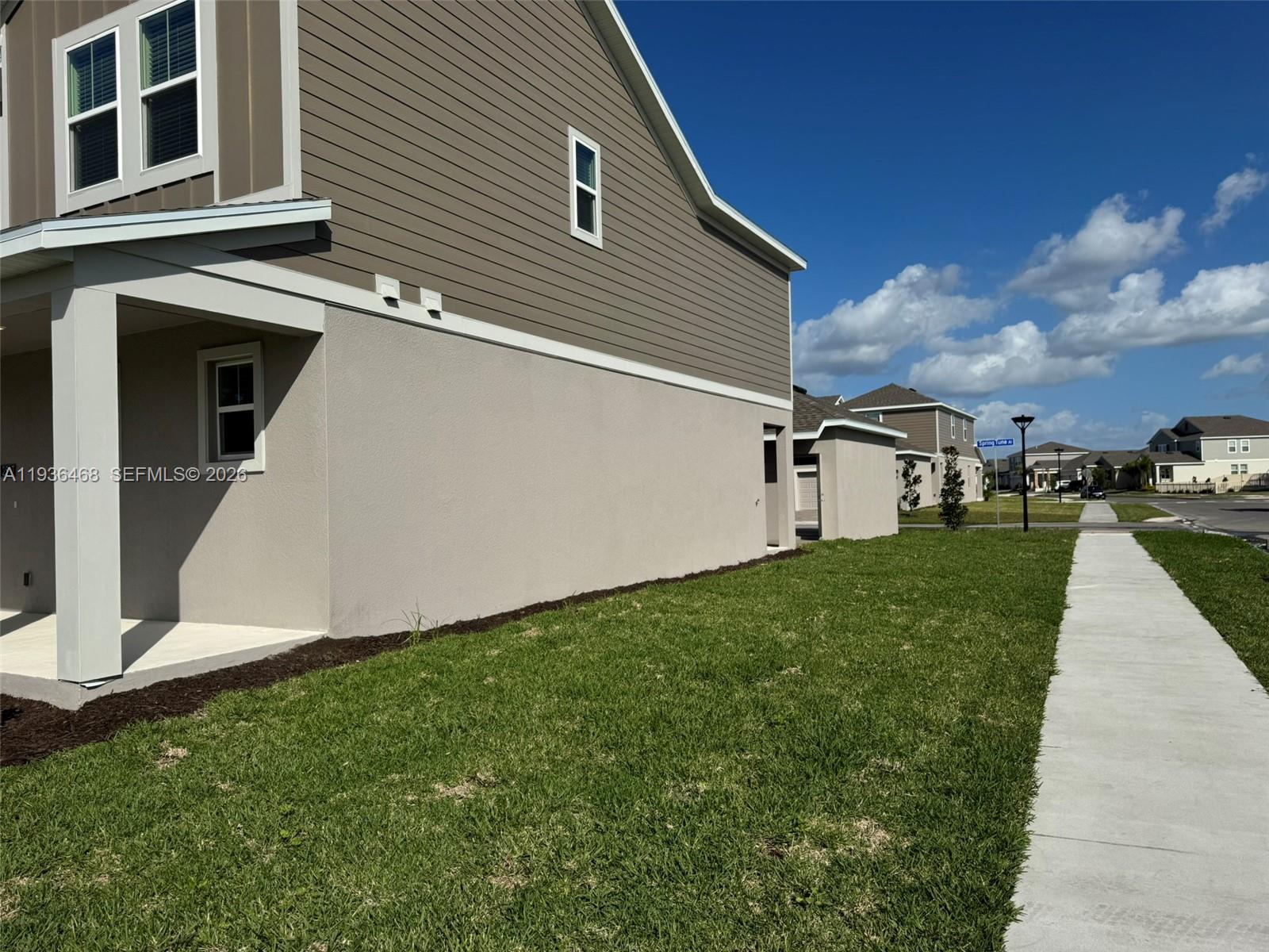 2517 Spring Tune Alley Kissimmee, FL 34744 - Photo 3 of 16 a view of a house with backyard