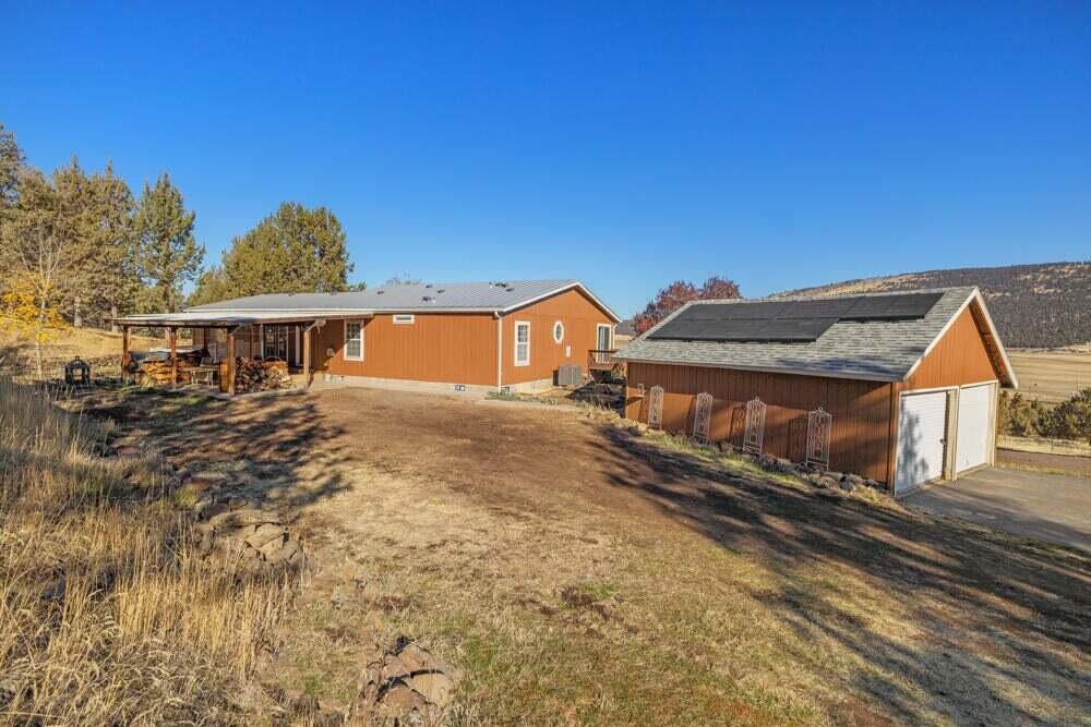 17550 South Poe Valley Road Klamath Falls, OR 97603 - Photo 45 of 59 a view of a house with a yard