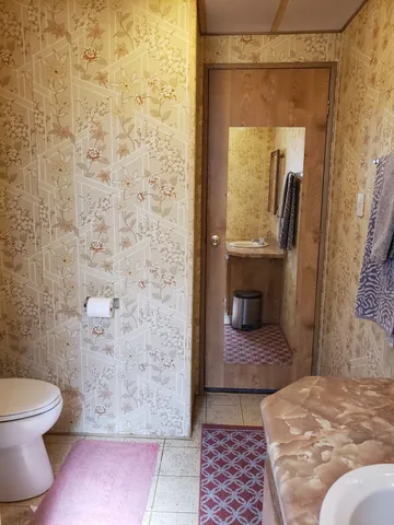 a workspace with furniture and window