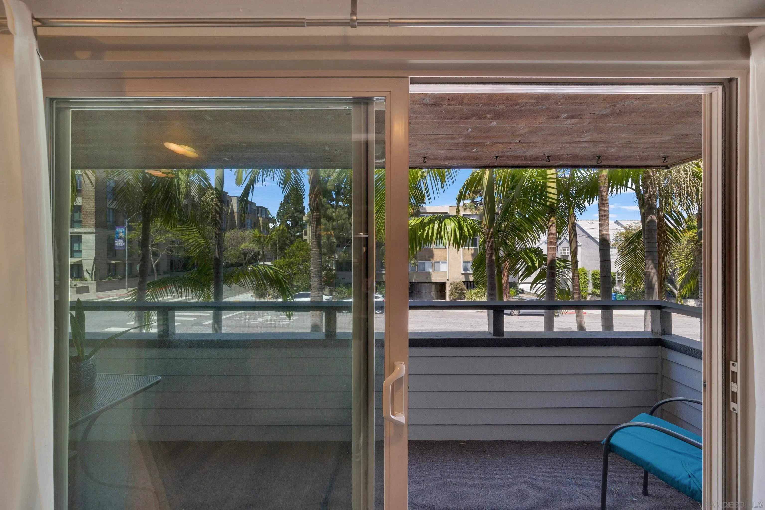 4055 Falcon Street, Unit 102 San Diego, CA 92103 - Photo 11 of 36 a view of front door and deck