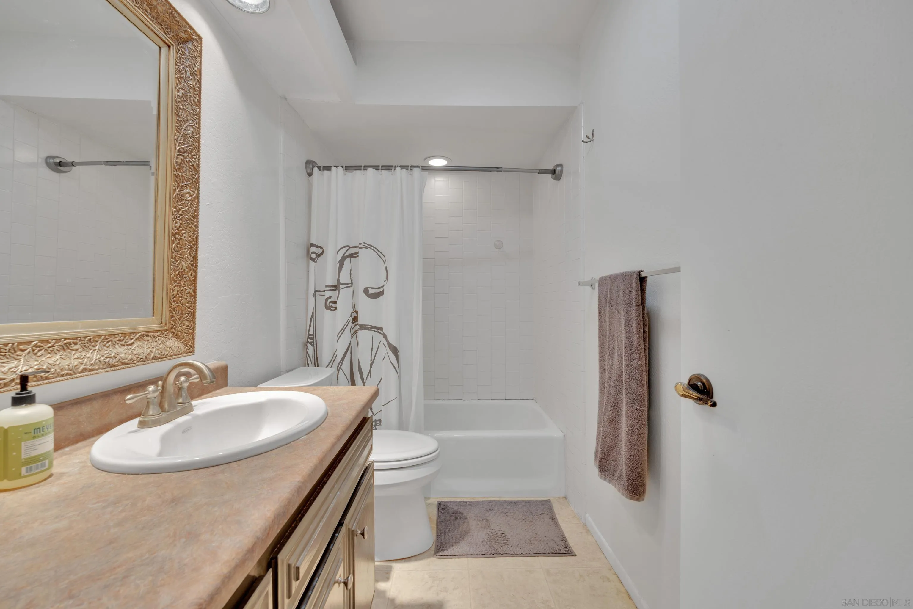 4055 Falcon Street, Unit 102 San Diego, CA 92103 - Photo 28 of 36 a bathroom with a sink toilet and shower