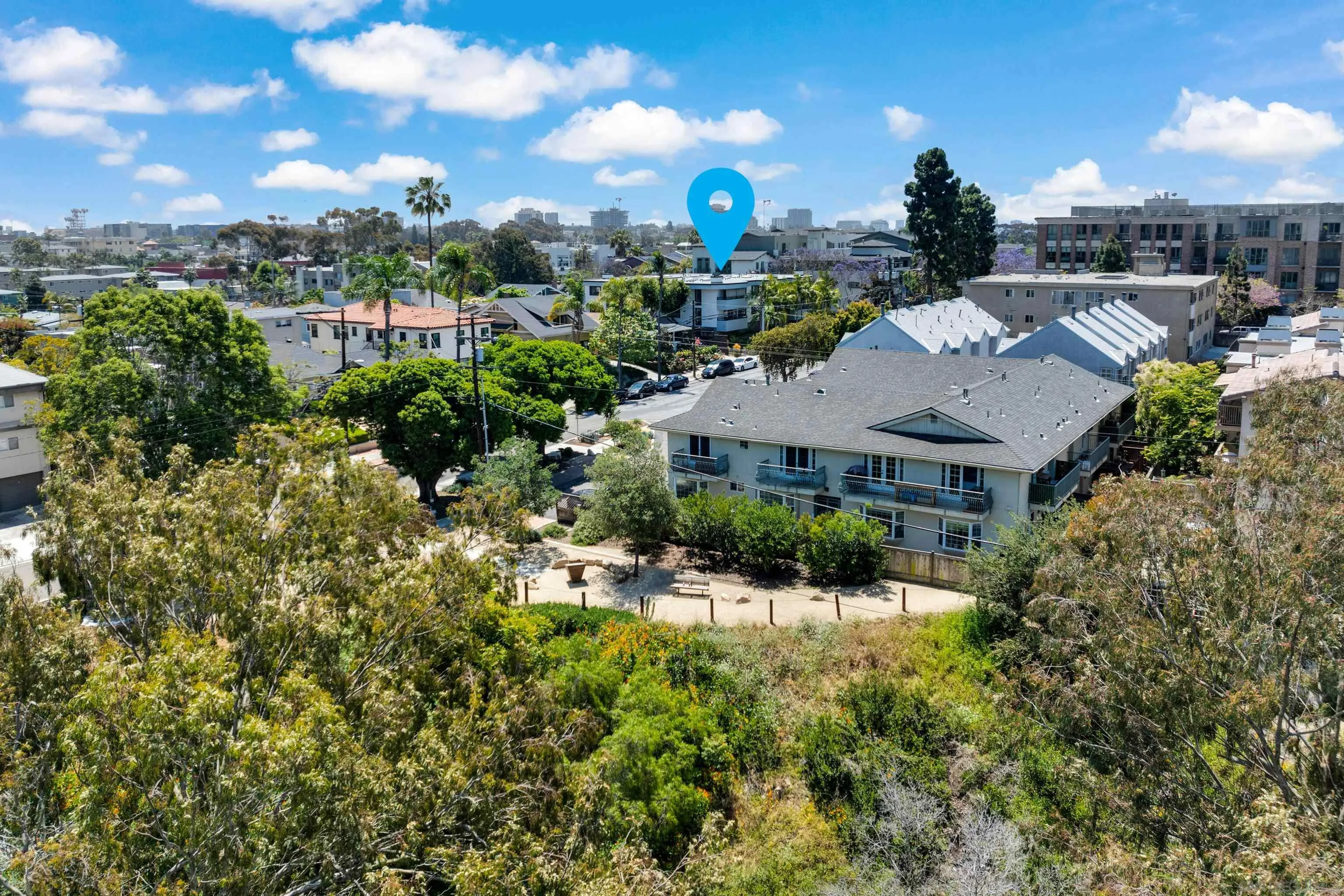 4055 Falcon Street, Unit 102 San Diego, CA 92103 - Photo 36 of 36 a view of a house with a yard and plants