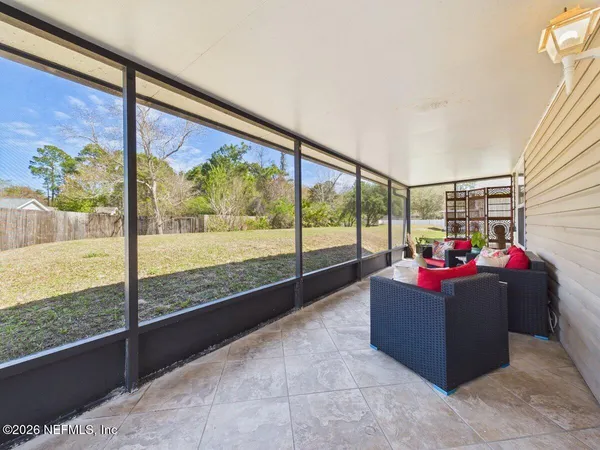a living room with couch and a table