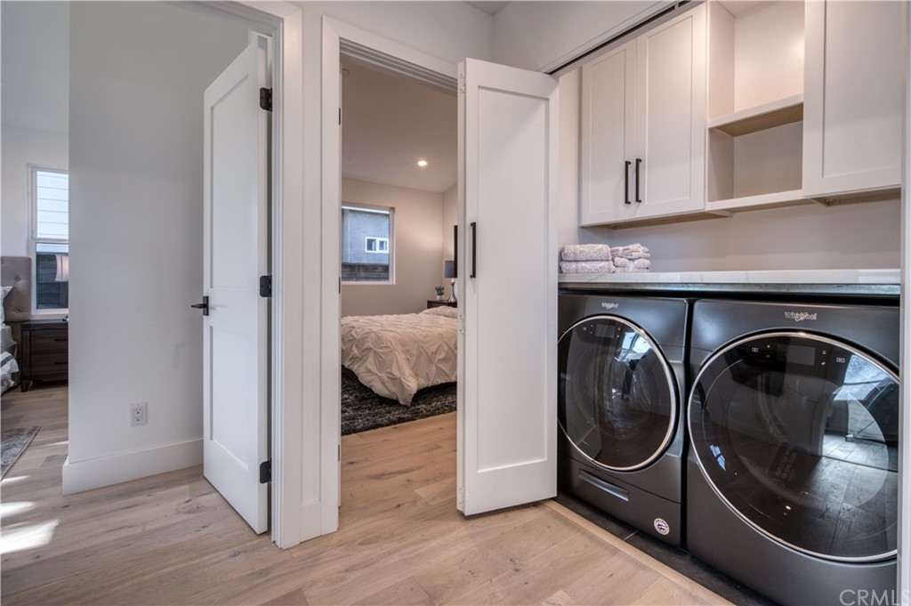 424 Esther Street Costa Mesa, CA 92627 - Photo 21 of 28 Laundry with Modern New Slate Washer and Dryer