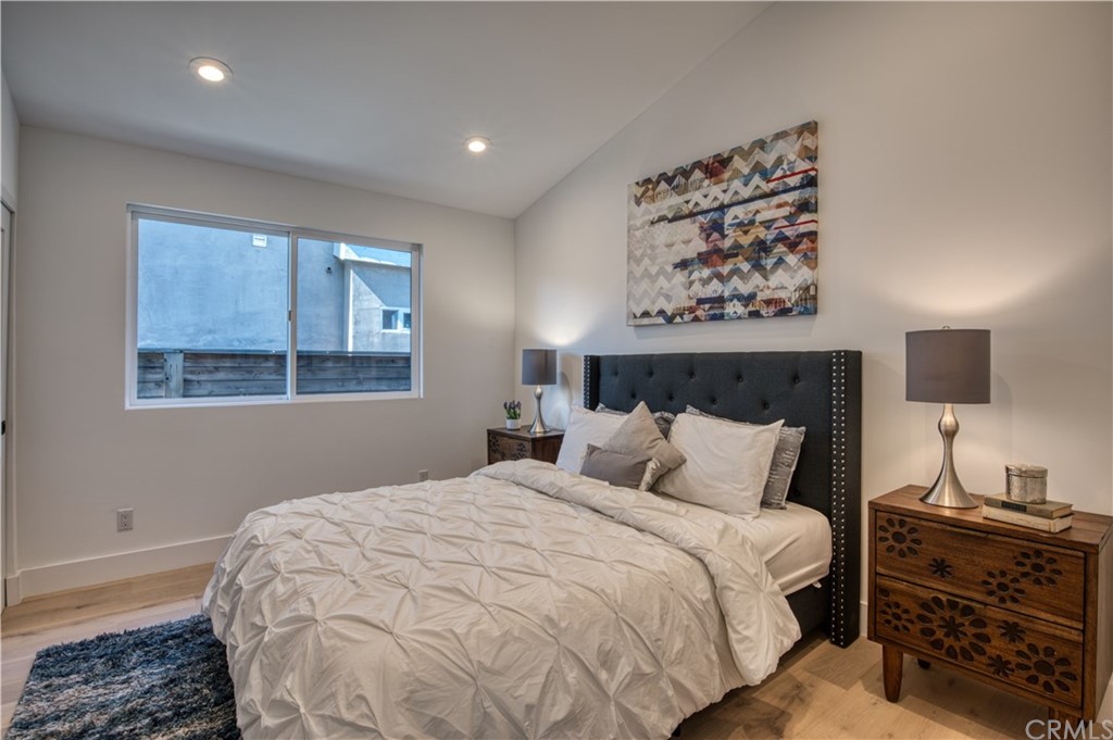 424 Esther Street Costa Mesa, CA 92627 - Photo 24 of 28 Bedroom with Vaulted Ceiling