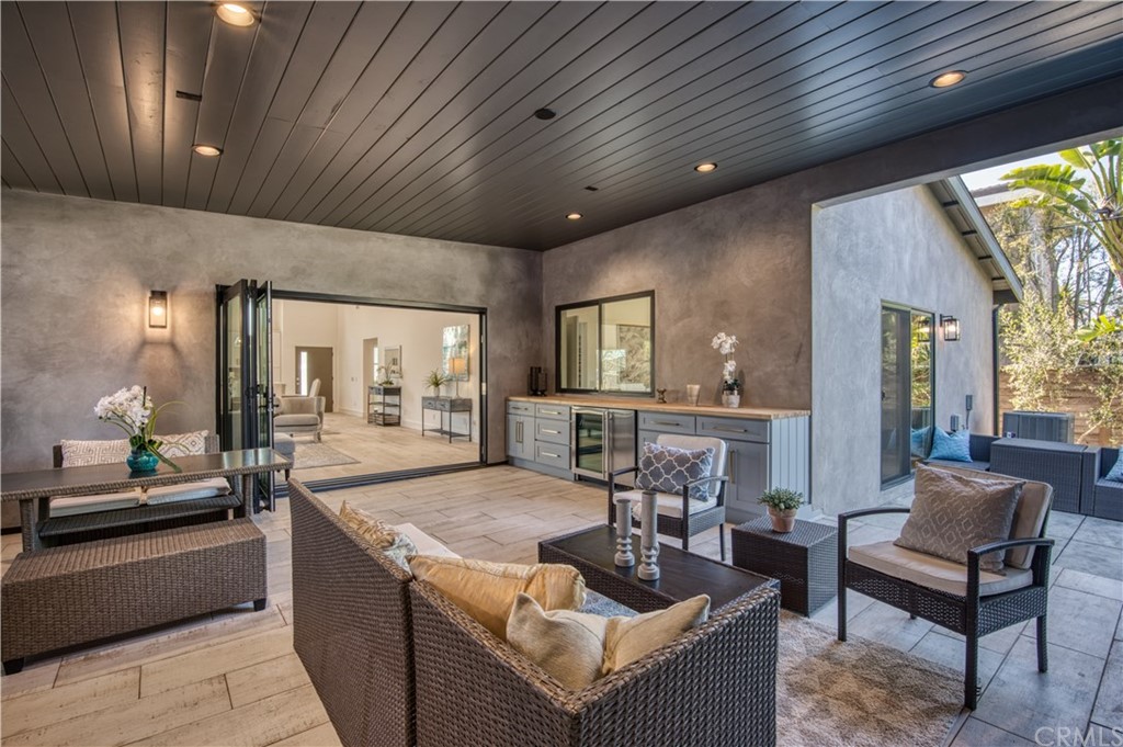 424 Esther Street Costa Mesa, CA 92627 - Photo 4 of 28 CA Room with built-in Wine Fridge and Bar.