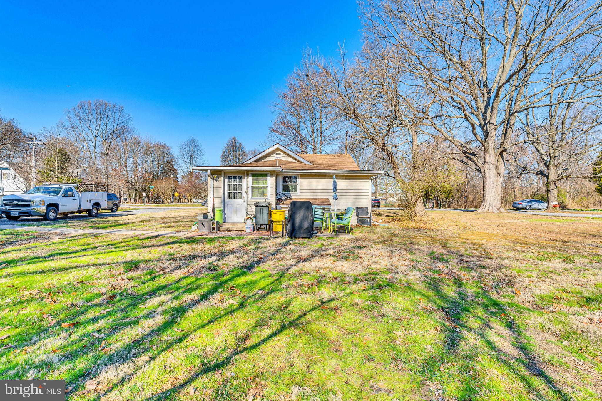 4871 Avery Road Shady Side, MD 20764 - Photo 13 of 20 a front view of a building with a yard