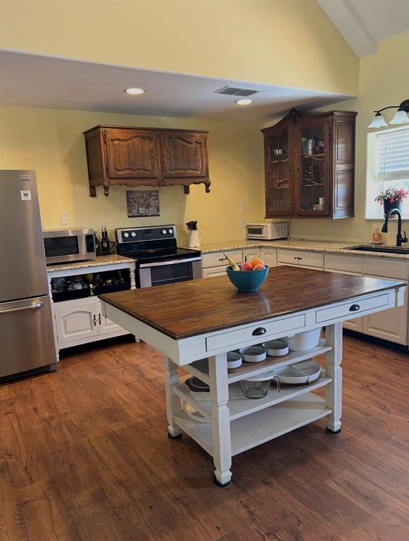 1794 Cr 527 Road Baird, TX 79504 - Photo 23 of 38 Wood-finish flooring with a vaulted ceiling
