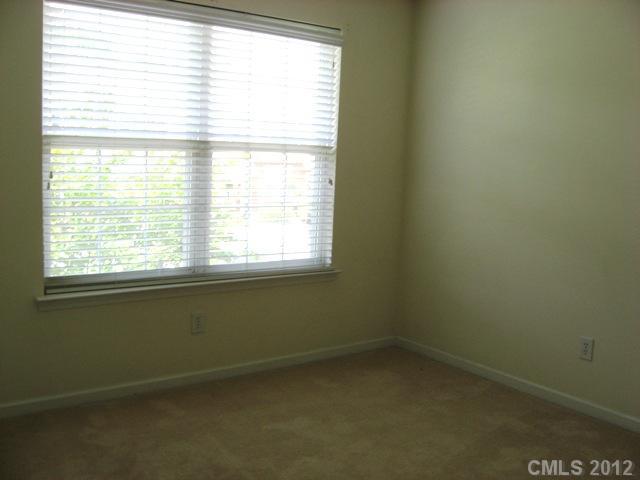 733 Shellstone Place, Unit 733 Fort Mill, SC 29708 - Photo 13 of 16 an empty room with a window