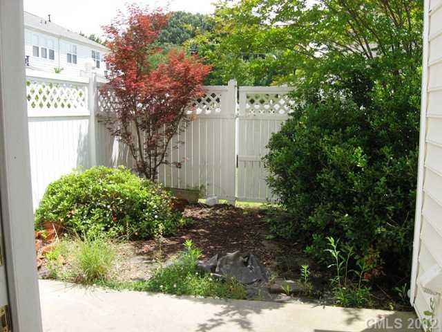 733 Shellstone Place, Unit 733 Fort Mill, SC 29708 - Photo 15 of 16 a backyard of a house with lots of green space