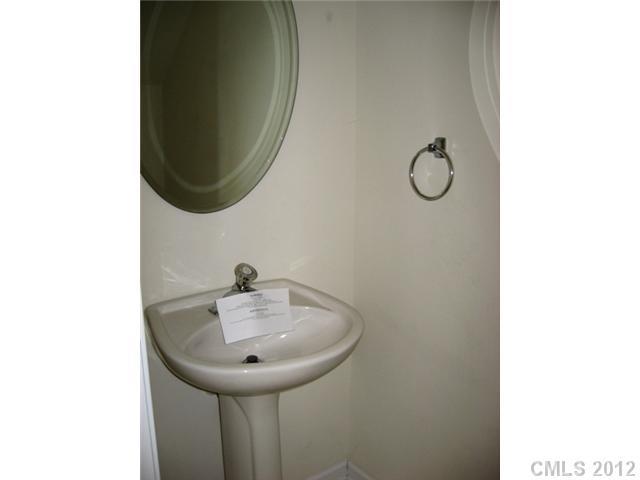 733 Shellstone Place, Unit 733 Fort Mill, SC 29708 - Photo 8 of 16 a bathroom with a sink and a mirror