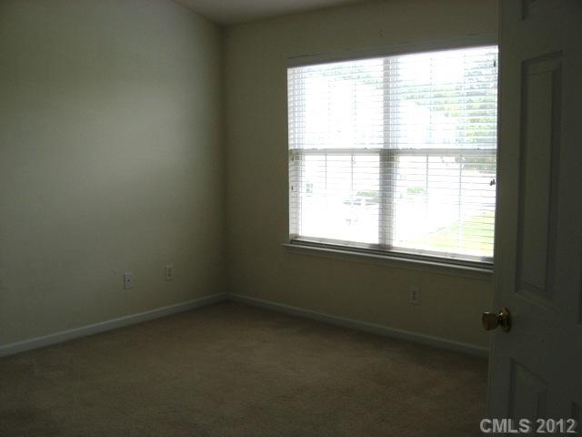 733 Shellstone Place, Unit 733 Fort Mill, SC 29708 - Photo 10 of 16 an empty room with a window