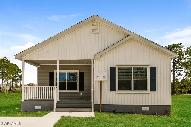 a view of house with front door