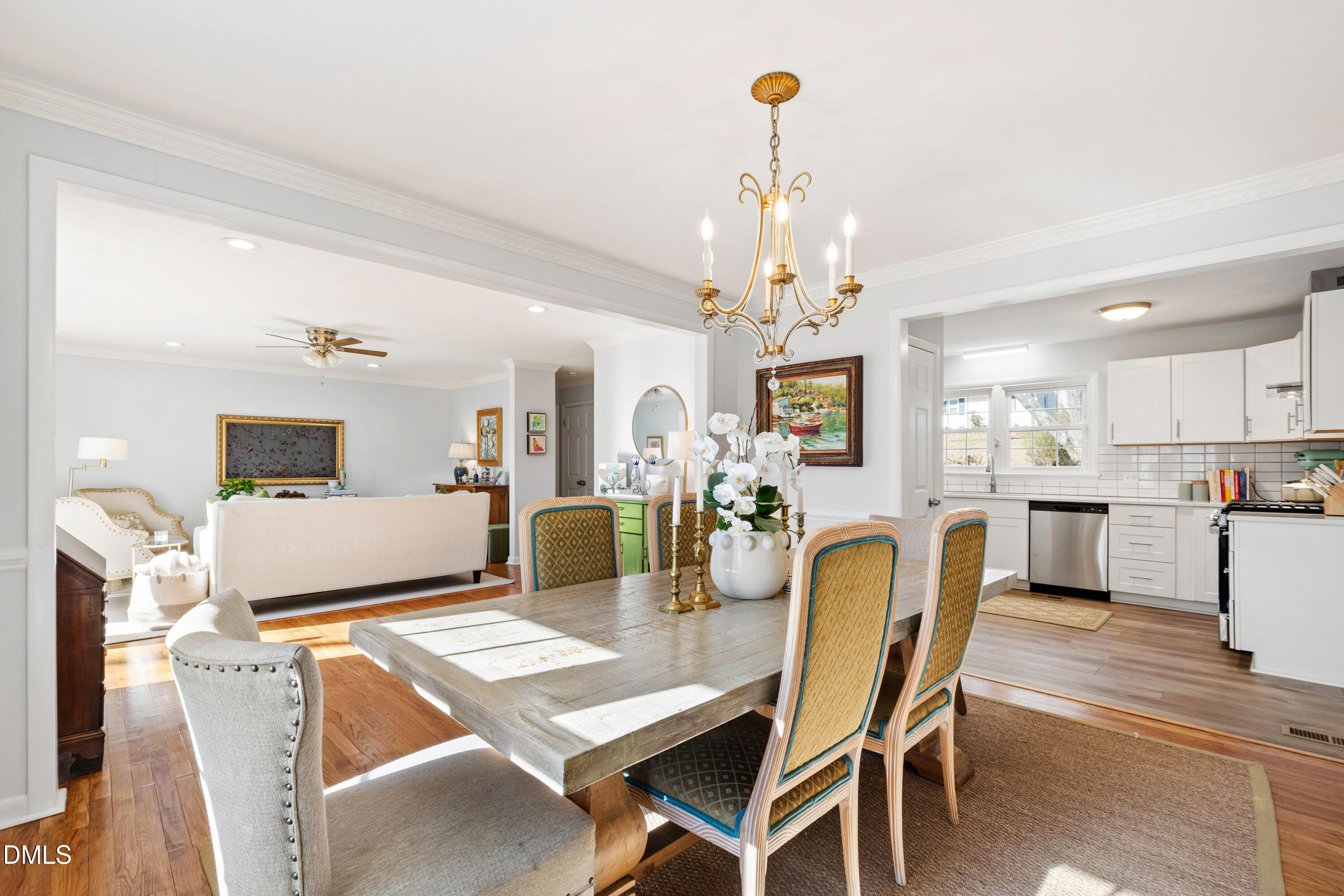 211 Northfield Drive Raleigh, NC 27609 - Photo 11 of 49 a view of a dining room with furniture and chandelier