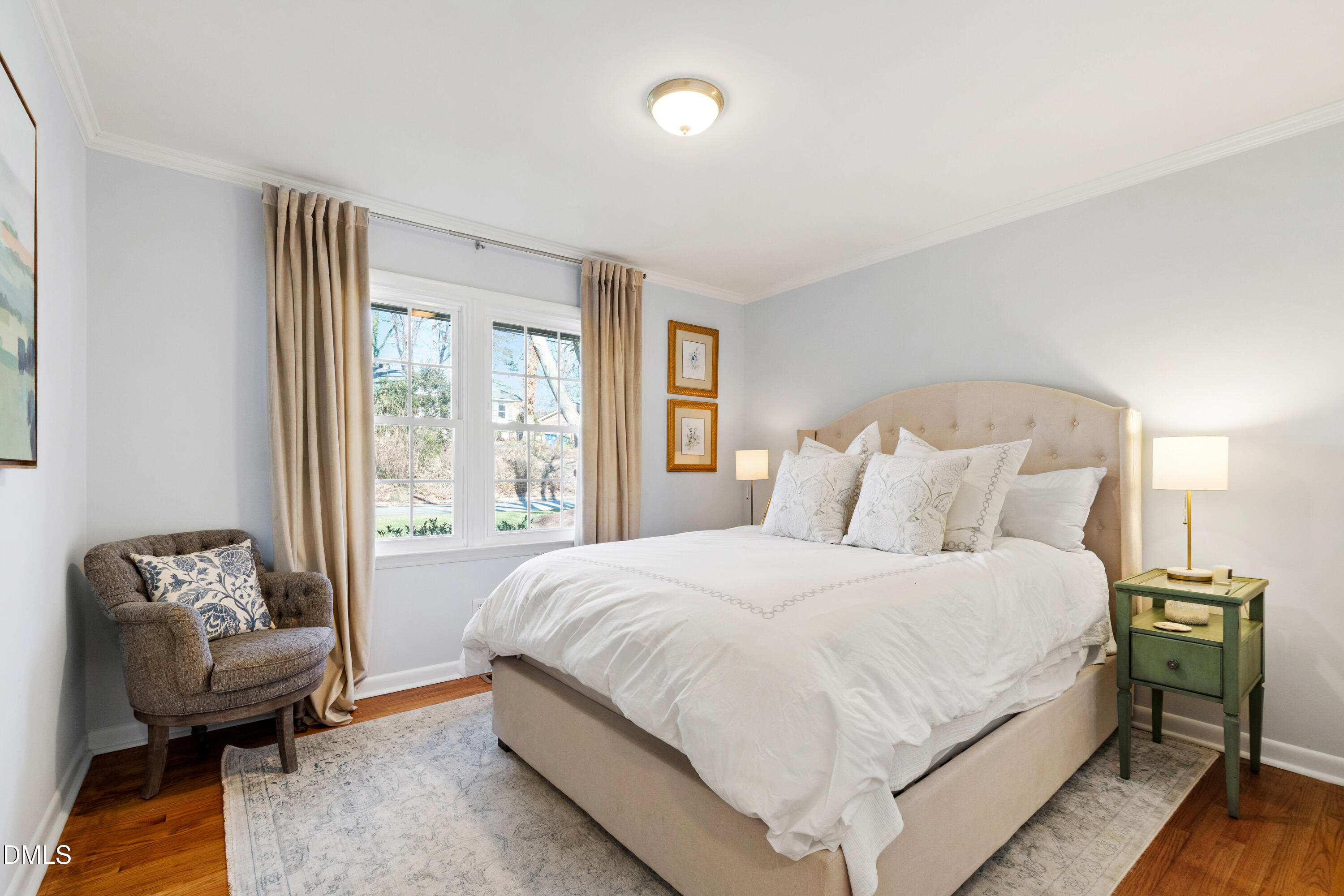 211 Northfield Drive Raleigh, NC 27609 - Photo 22 of 49 a bedroom with a bed and wooden floor