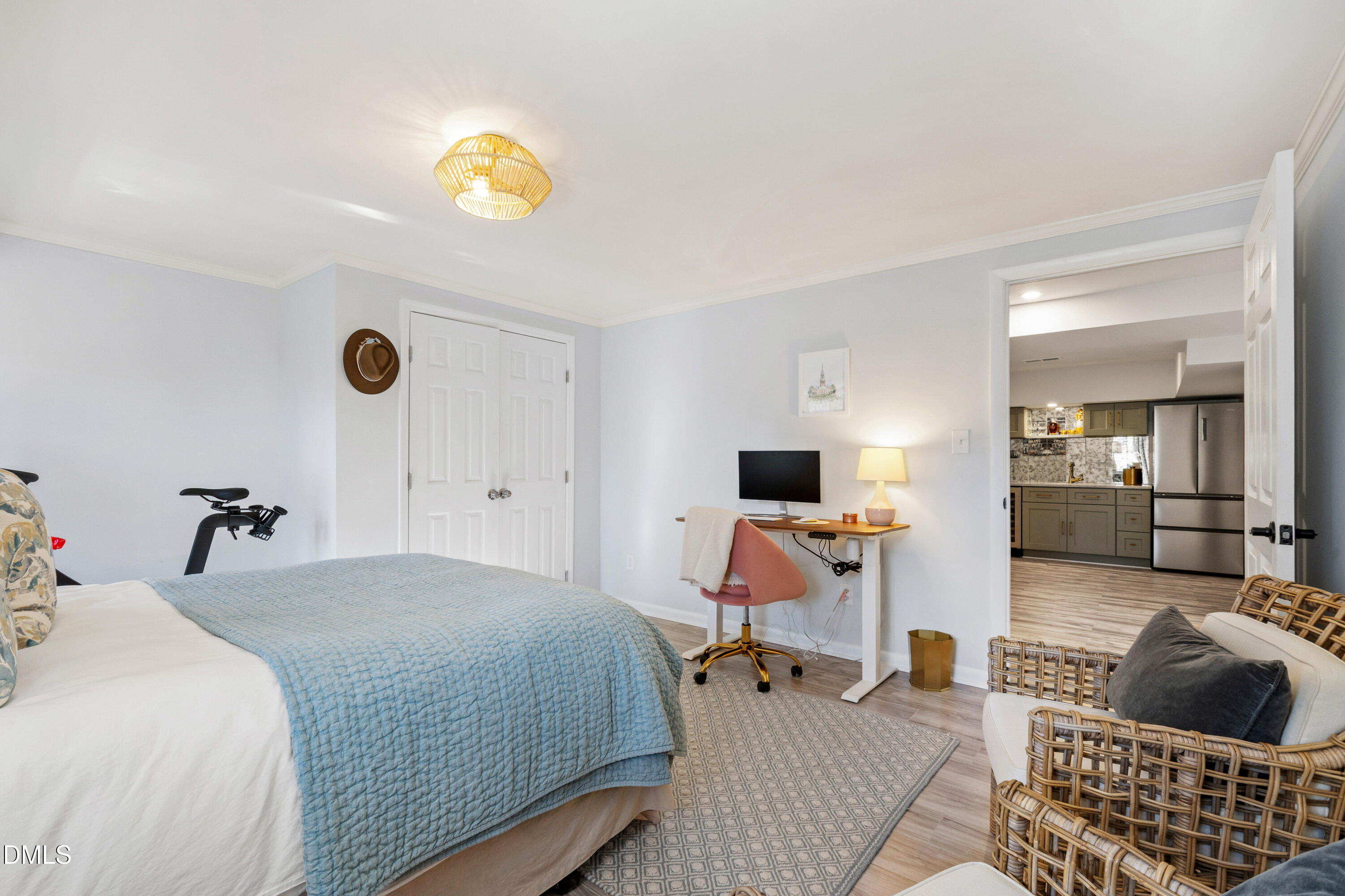 211 Northfield Drive Raleigh, NC 27609 - Photo 34 of 49 a bedroom with a bed and a couch