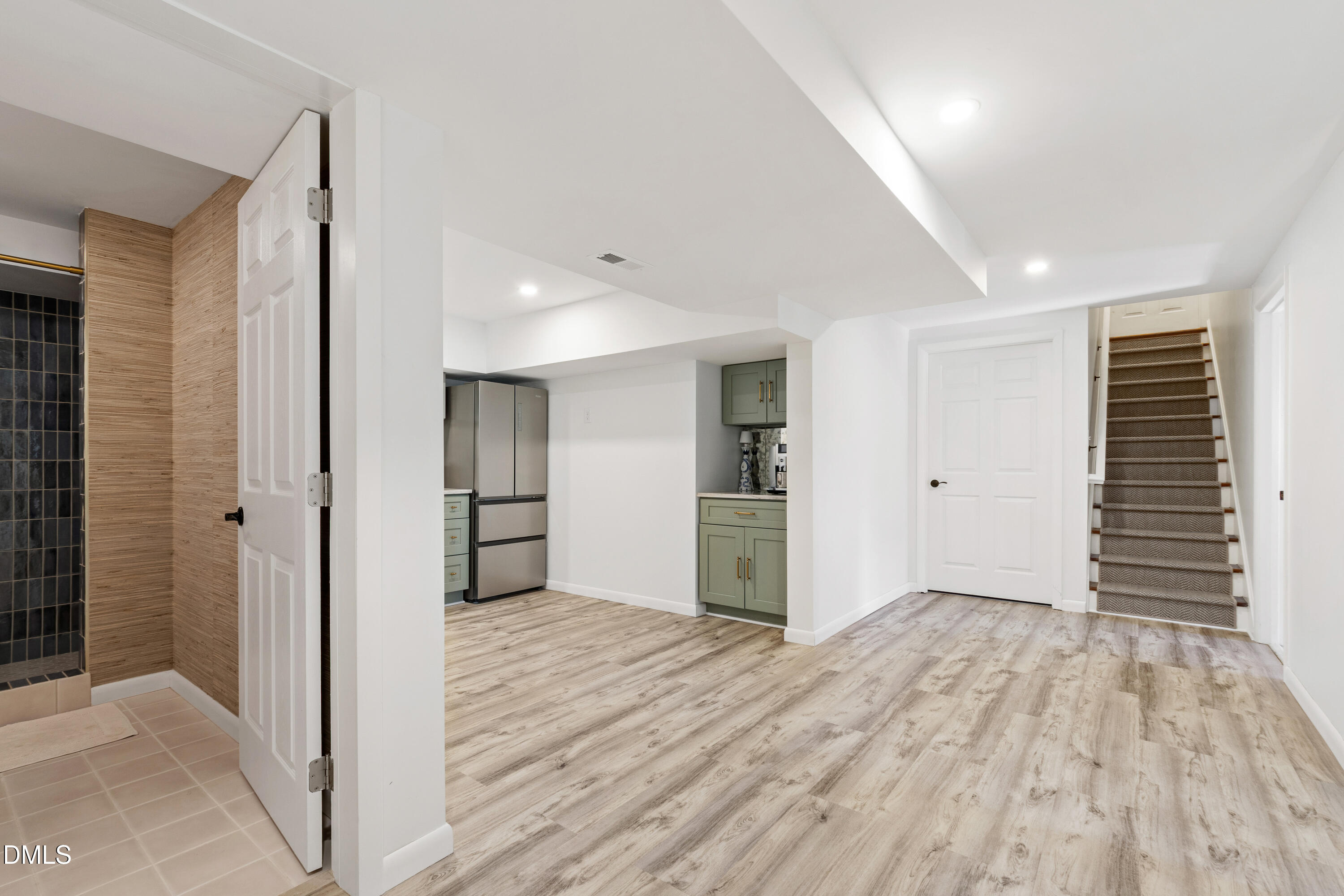 211 Northfield Drive Raleigh, NC 27609 - Photo 35 of 49 a view of empty room with wooden floor
