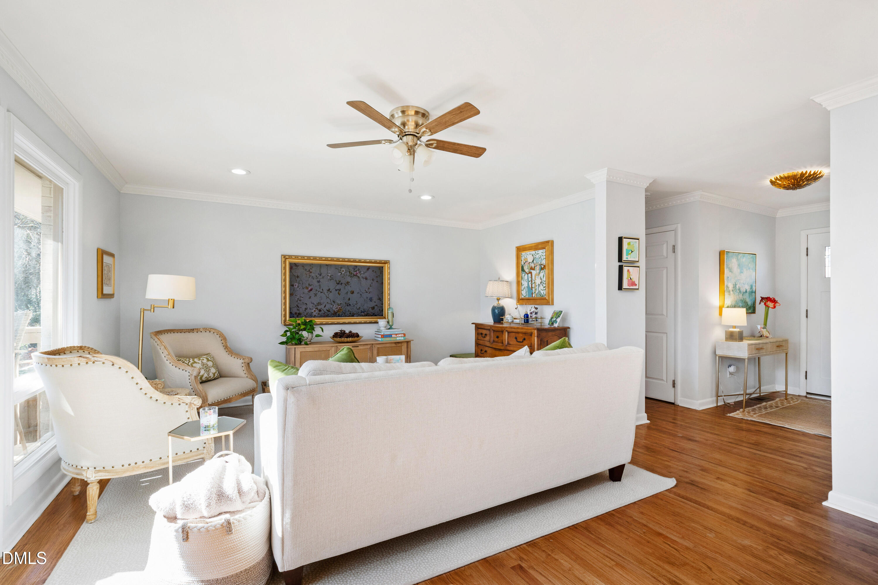 211 Northfield Drive Raleigh, NC 27609 - Photo 4 of 49 a living room with furniture and a flat screen tv