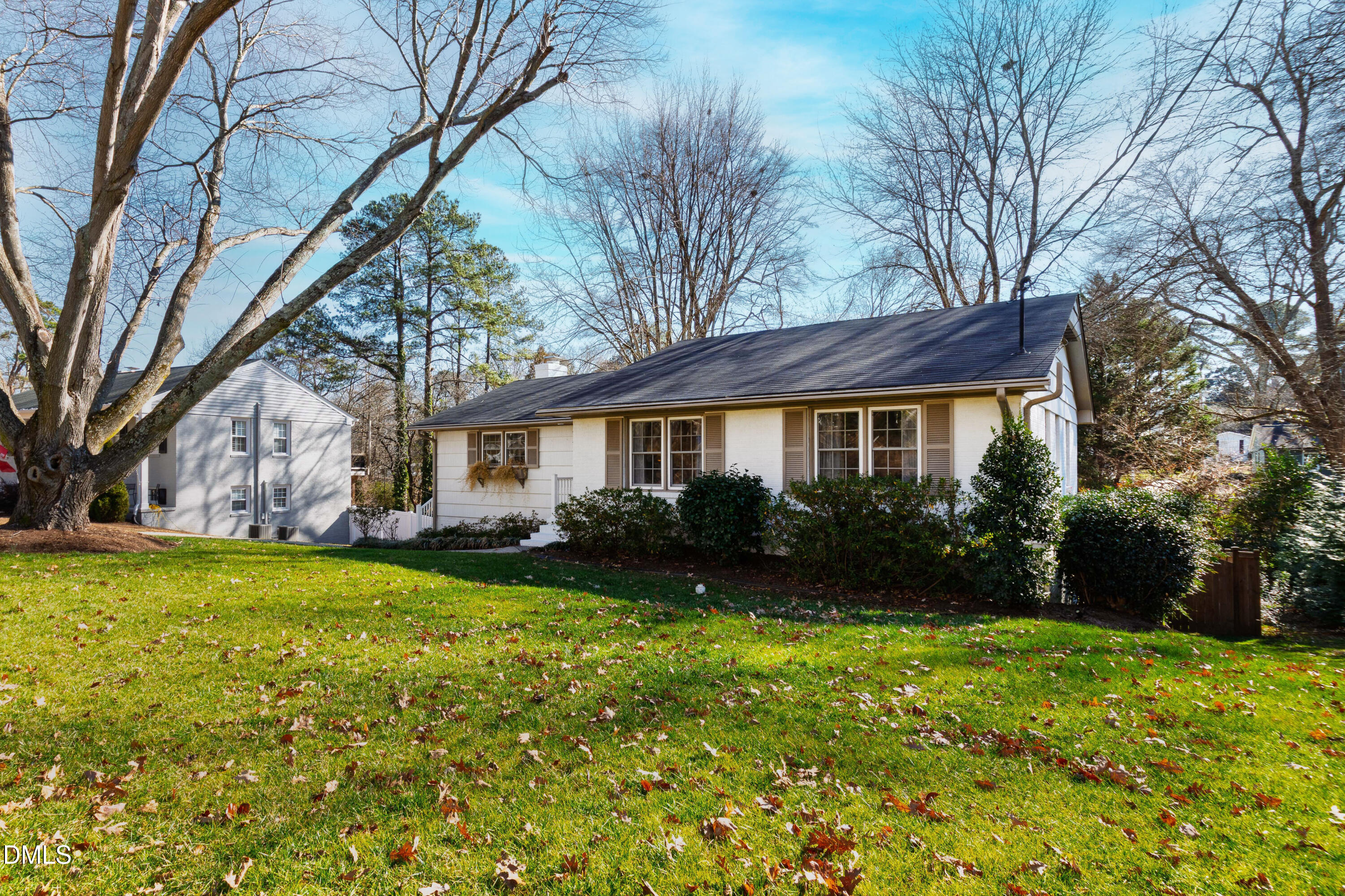 211 Northfield Drive Raleigh, NC 27609 - Photo 48 of 49 a view of a house with backyard and garden