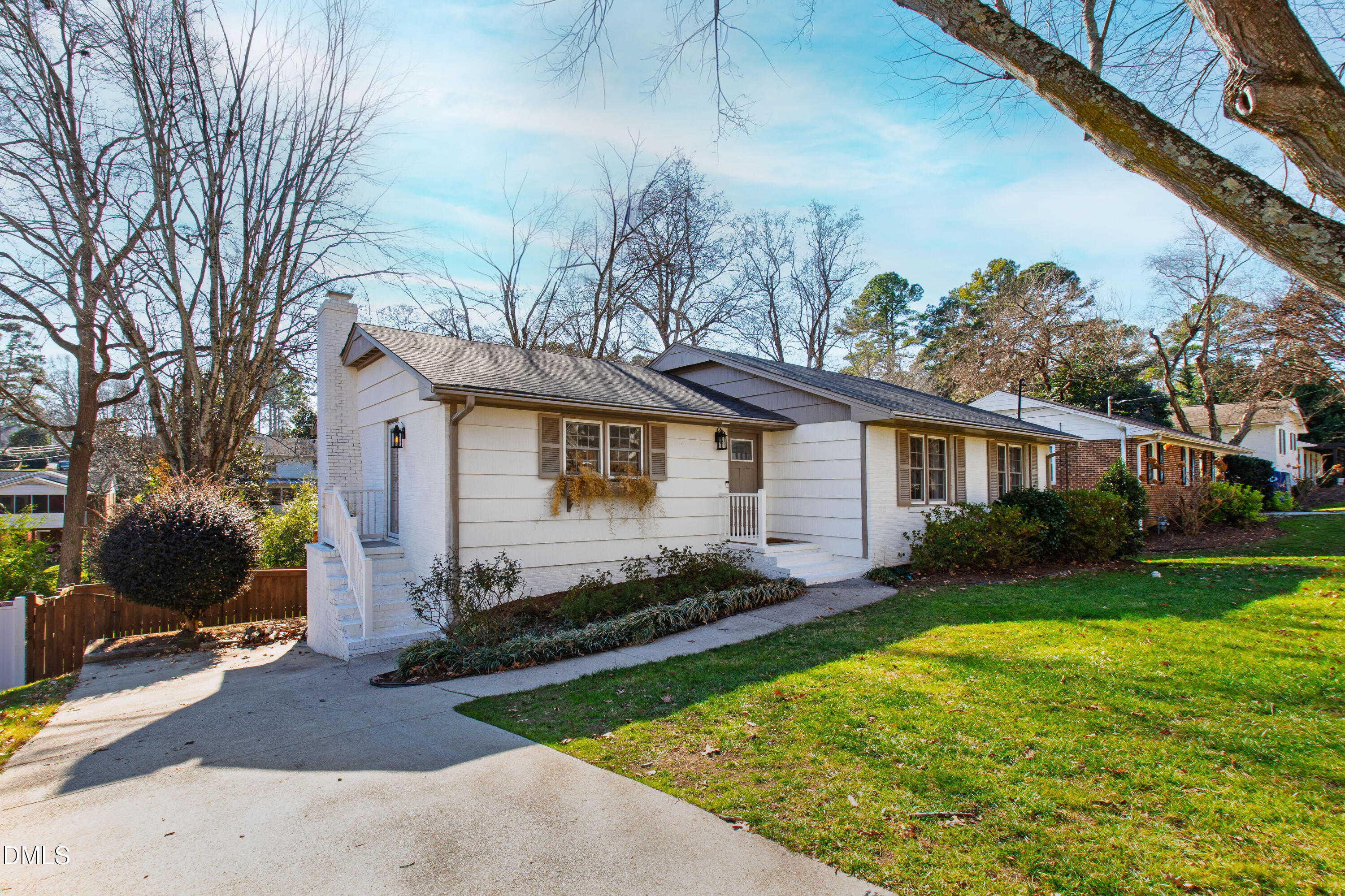 211 Northfield Drive Raleigh, NC 27609 - Photo 49 of 49 a front view of a house with garden