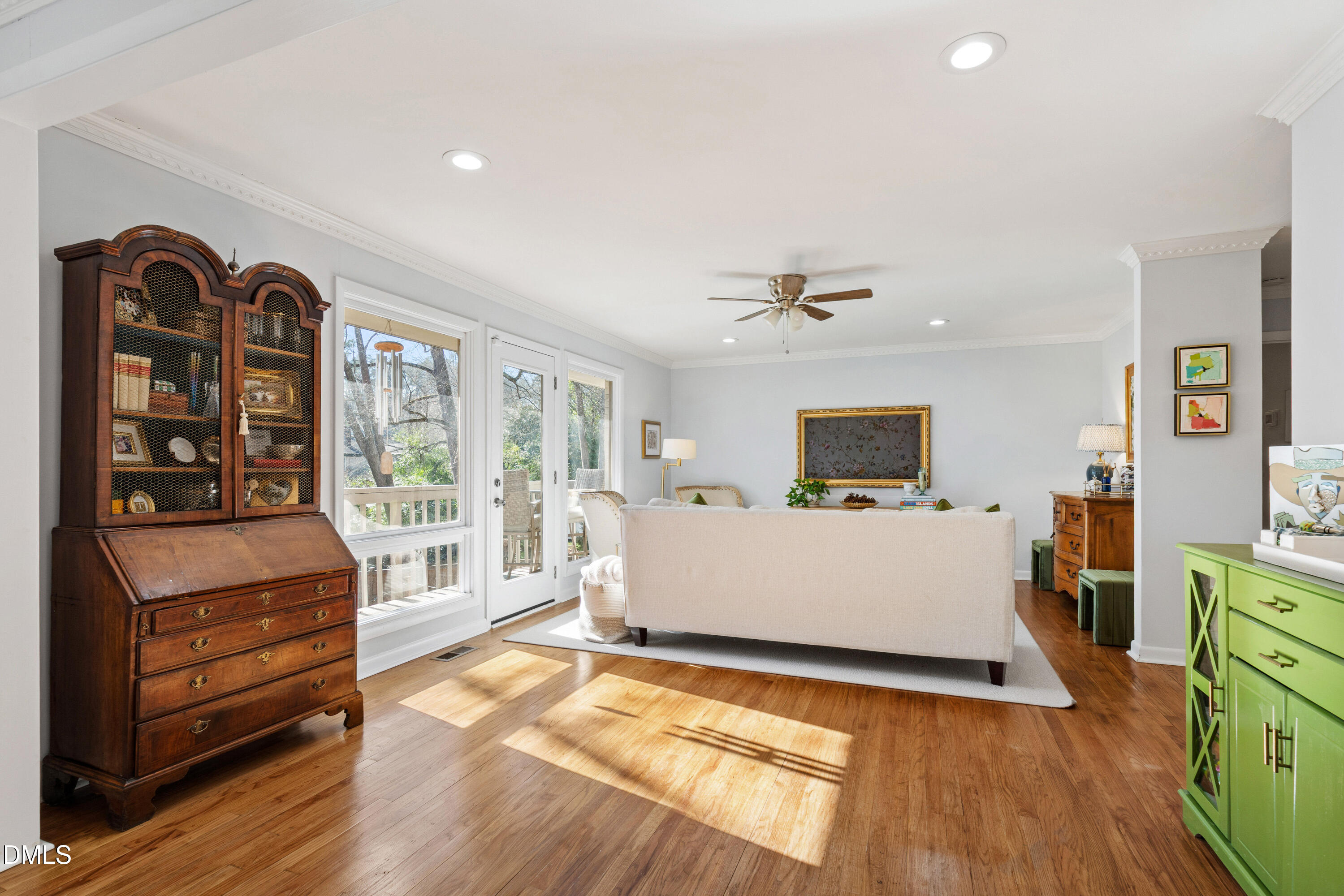 211 Northfield Drive Raleigh, NC 27609 - Photo 8 of 49 a living room with furniture a wooden floor and floors