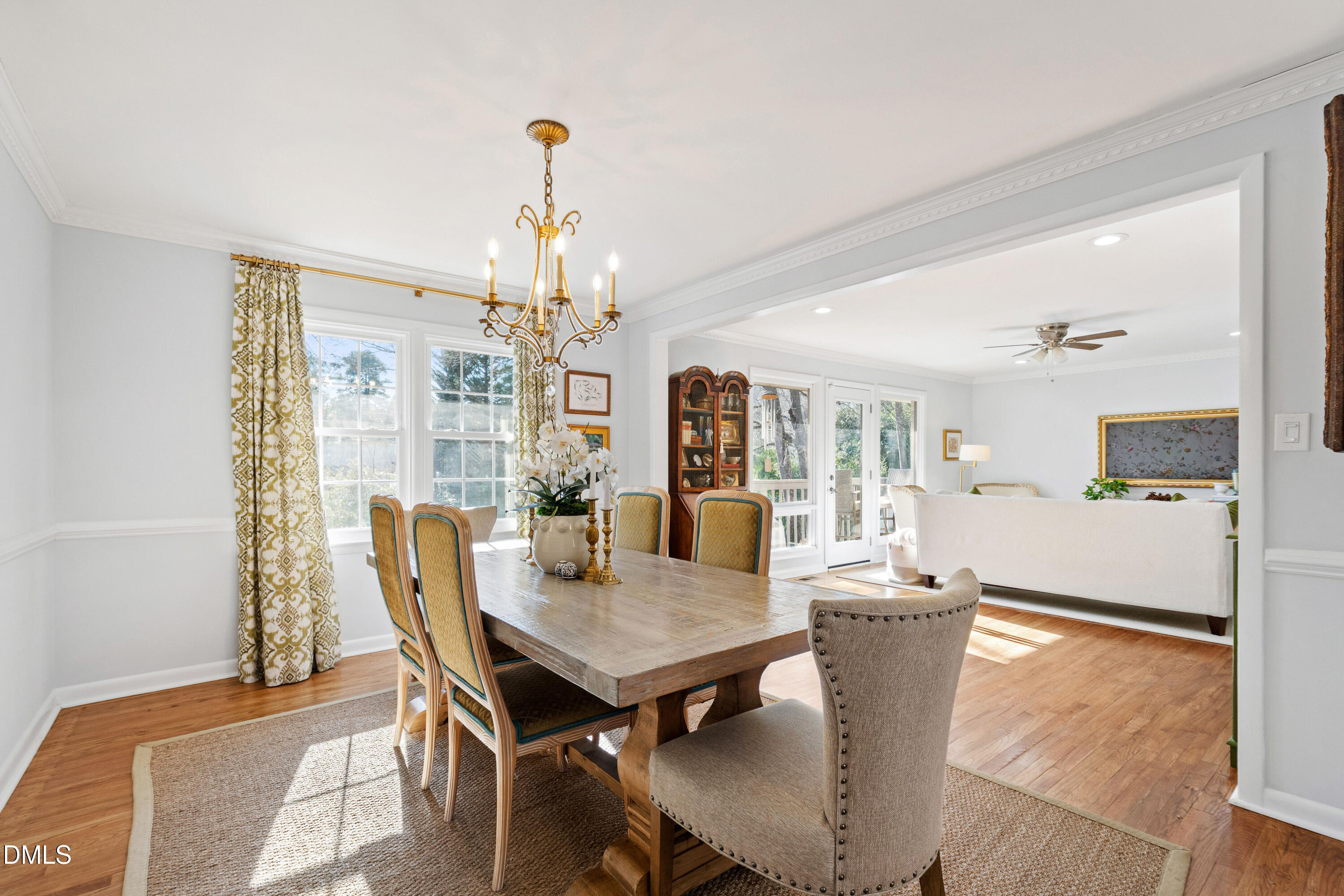 211 Northfield Drive Raleigh, NC 27609 - Photo 9 of 49 a view of a dining room with furniture window and wooden floor